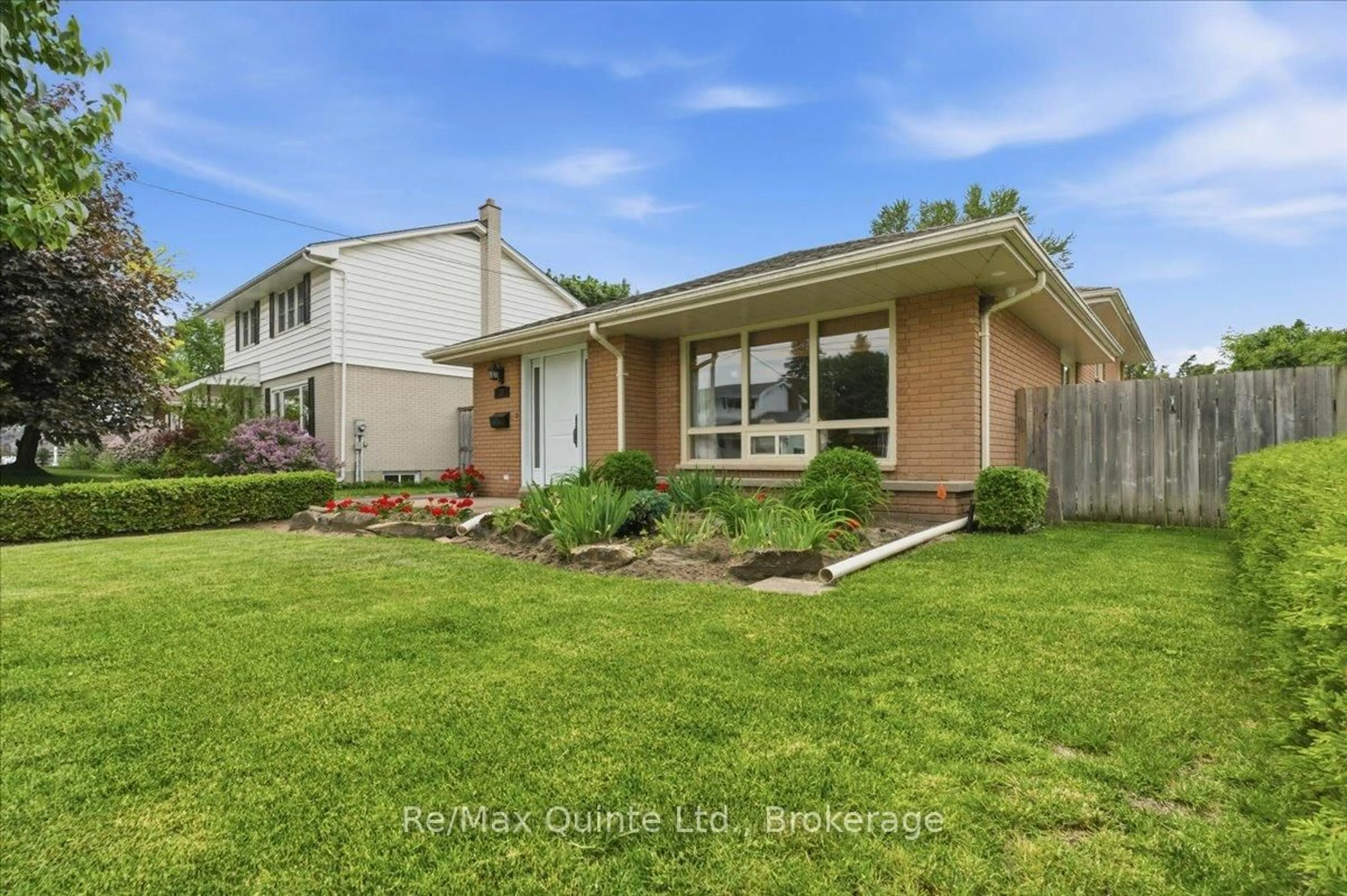 Home with brick exterior material, street for 18 Plaza Sq, Belleville Ontario K8N 4J3