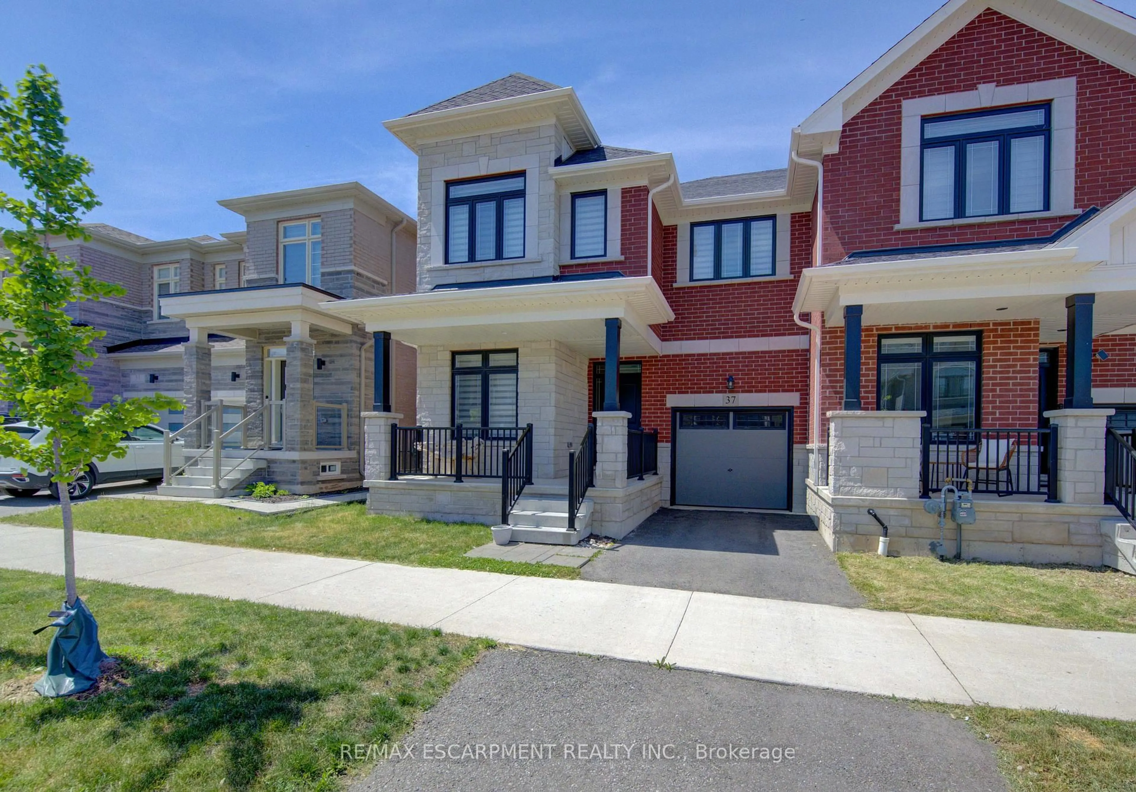 Home with brick exterior material, street for 37 Great Falls Blvd, Hamilton Ontario L8B 1X8
