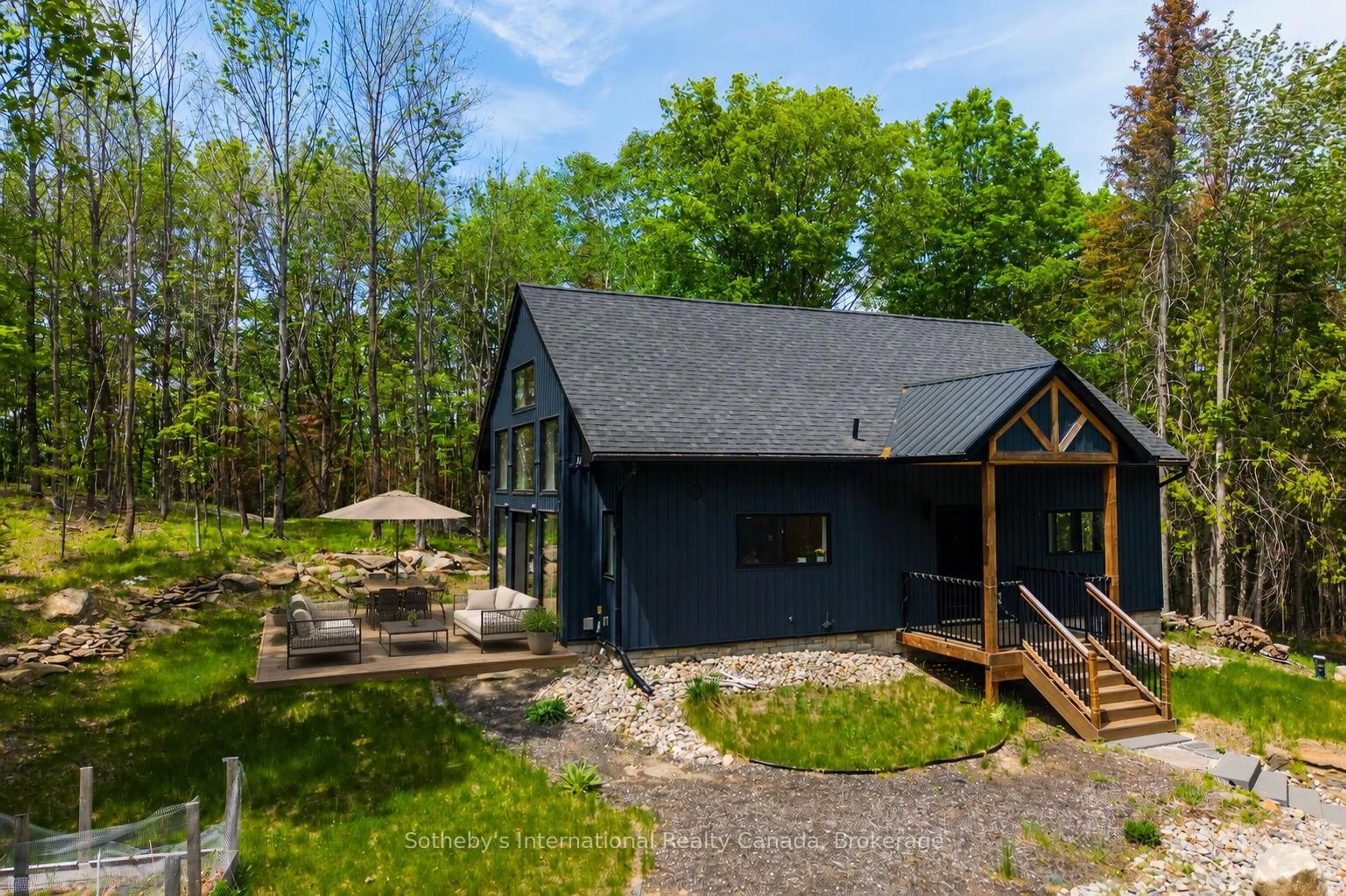 A pic from outside/outdoor area/front of a property/back of a property/a pic from drone, unknown for 1315 North Dr, Dysart et al Ontario K0M 1S0