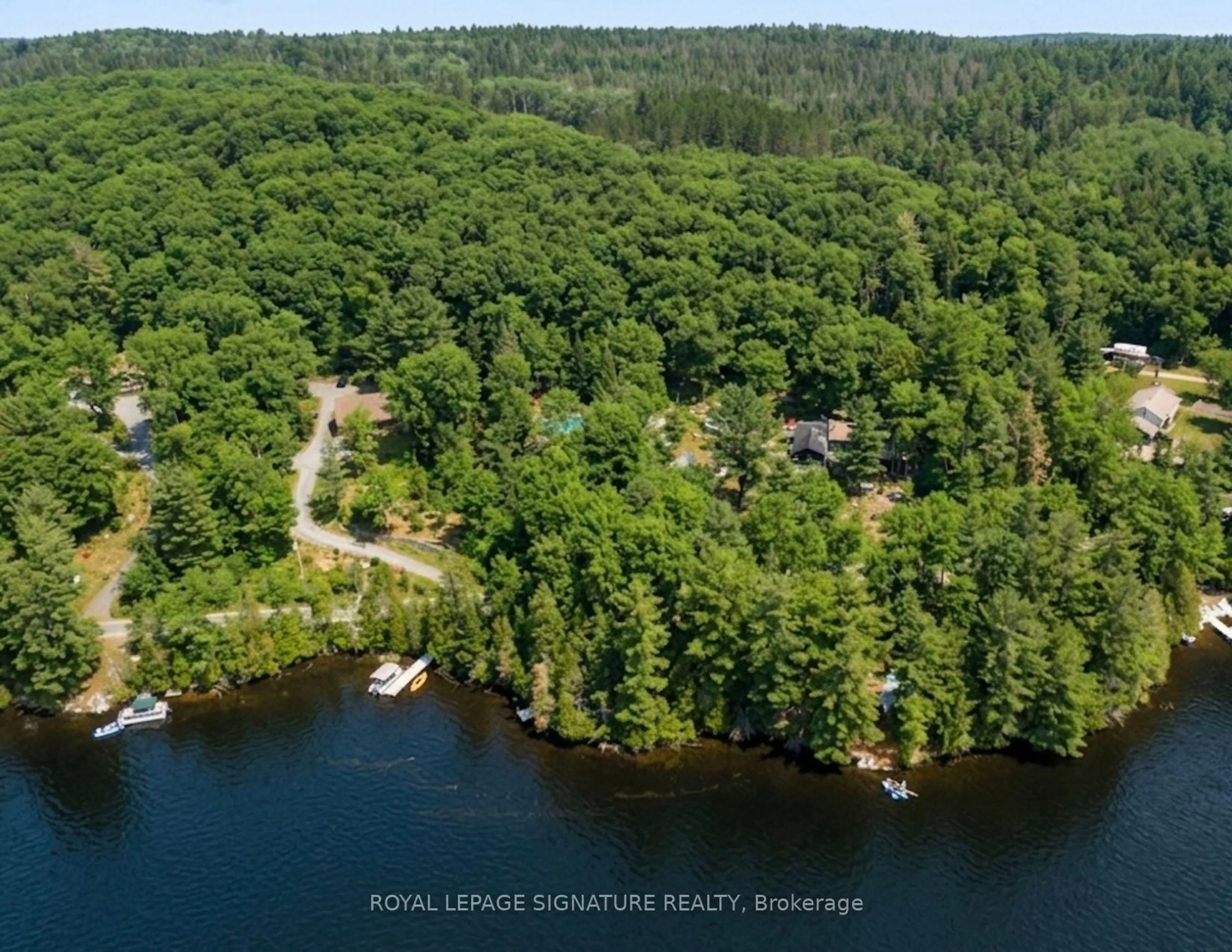 A pic from outside/outdoor area/front of a property/back of a property/a pic from drone, water/lake/river/ocean view for 613 Long Lake Rd, Perry Ontario P0A 1R0