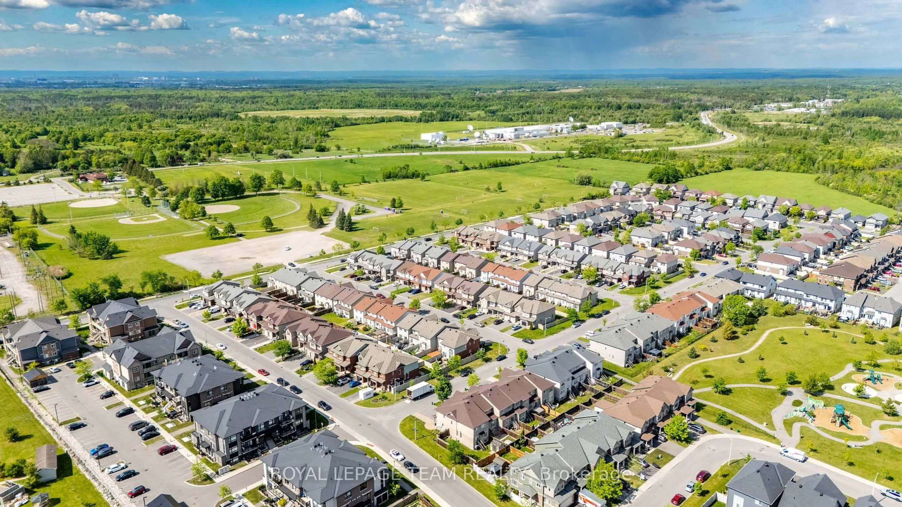 A pic from outside/outdoor area/front of a property/back of a property/a pic from drone, street for 605 Sunburst St, Ottawa Ontario K1T 0L1