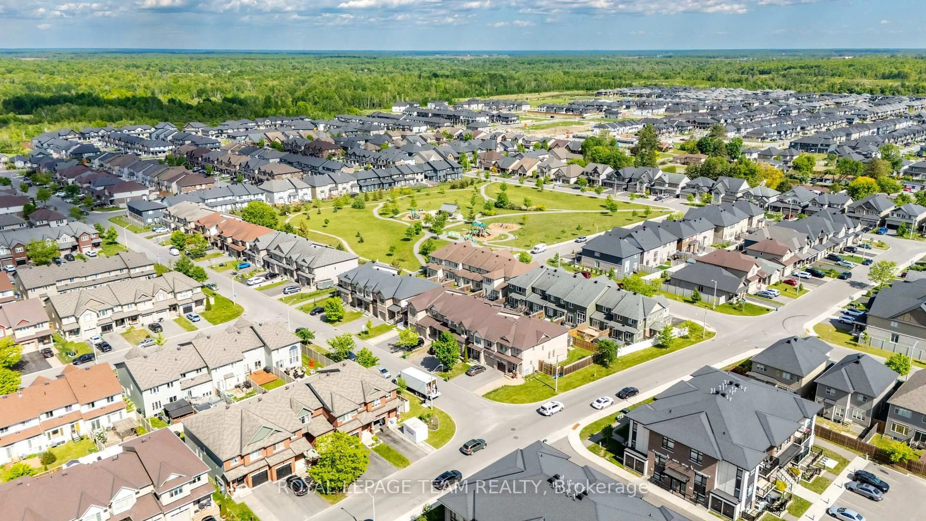 A pic from outside/outdoor area/front of a property/back of a property/a pic from drone, street for 605 Sunburst St, Ottawa Ontario K1T 0L1