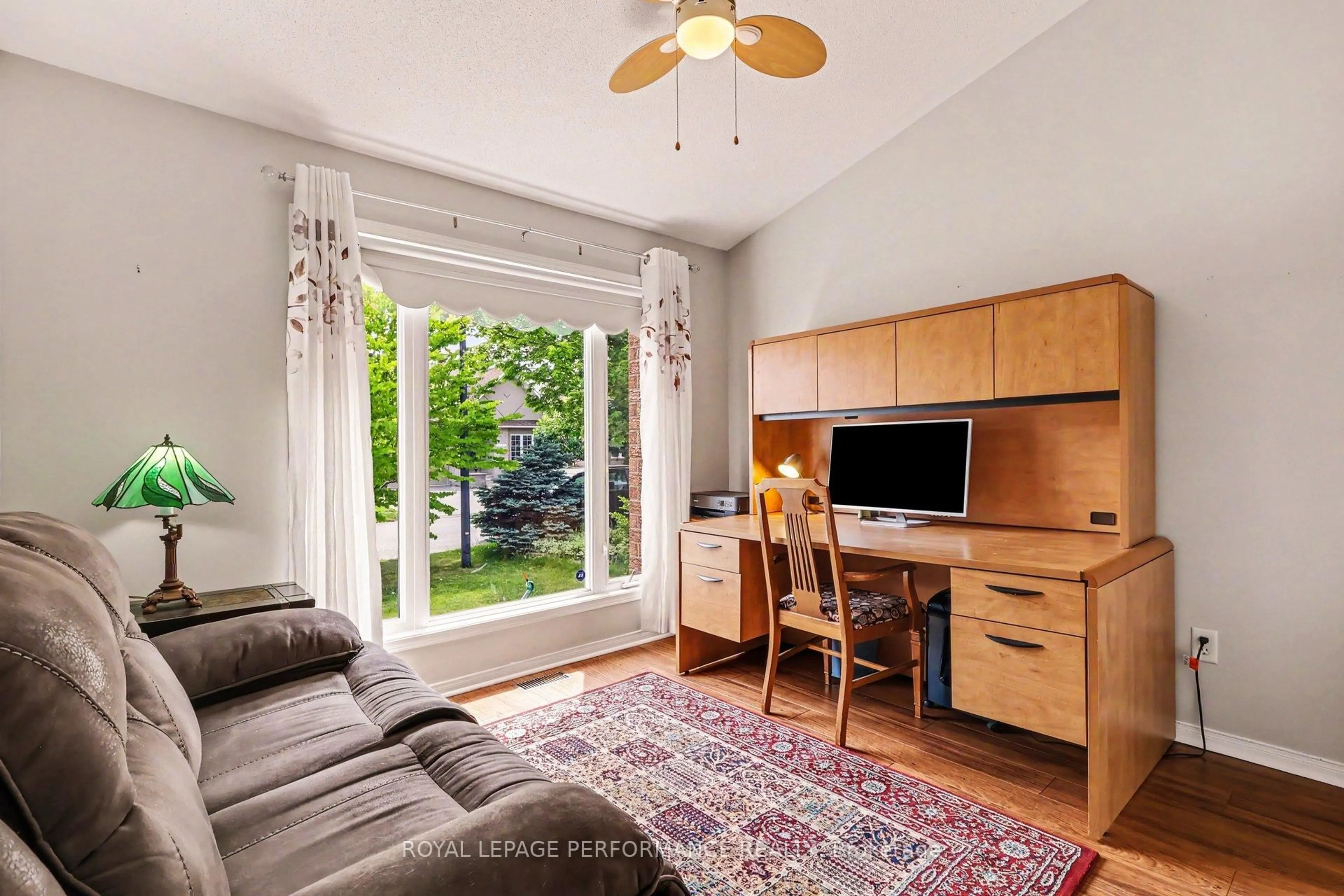 Living room with furniture, wood/laminate floor for 2110 Ricardo St, Ottawa Ontario K4A 4K6
