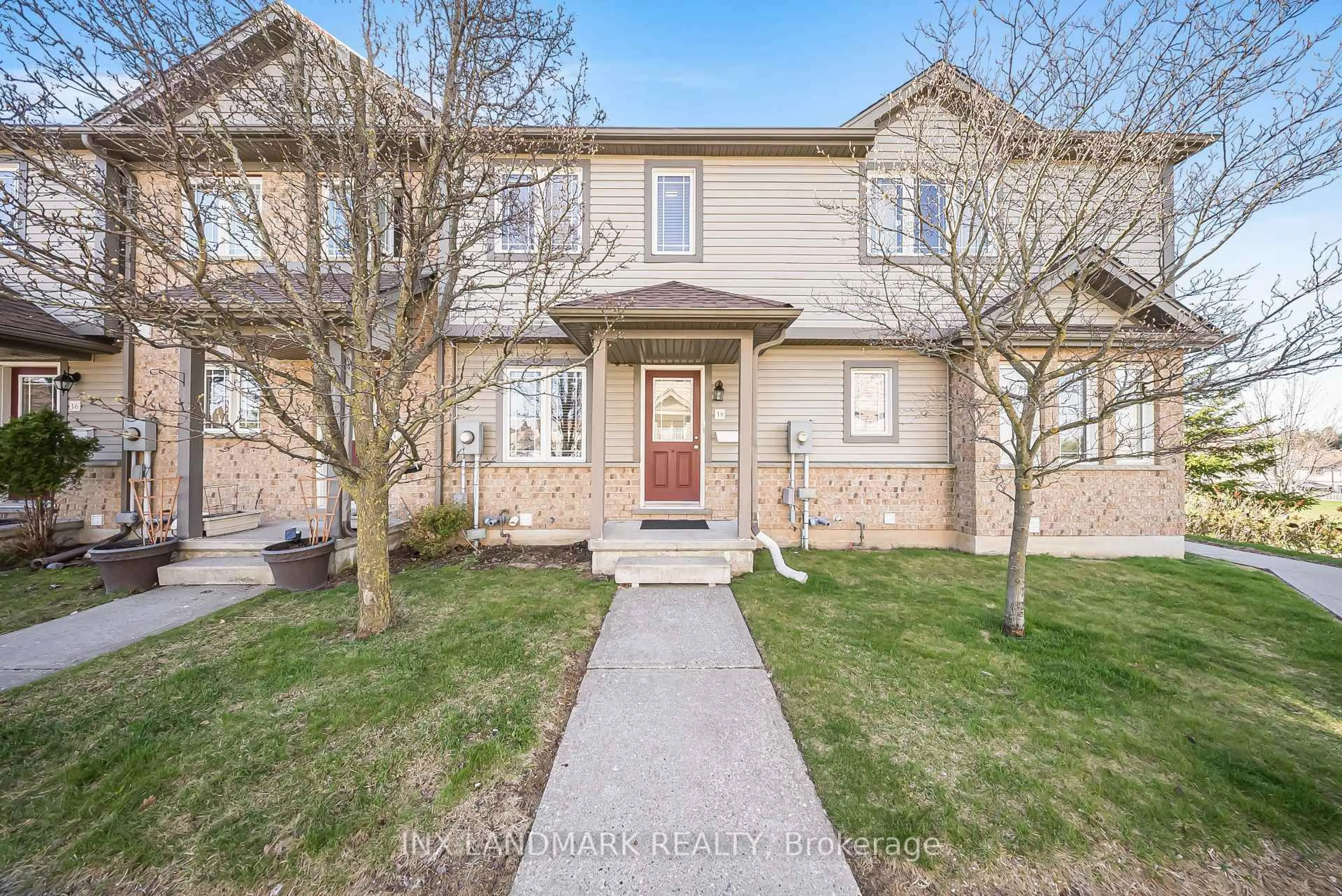 A pic from outside/outdoor area/front of a property/back of a property/a pic from drone, street for 535 Windflower Cres #18, Kitchener Ontario N2E 4L7