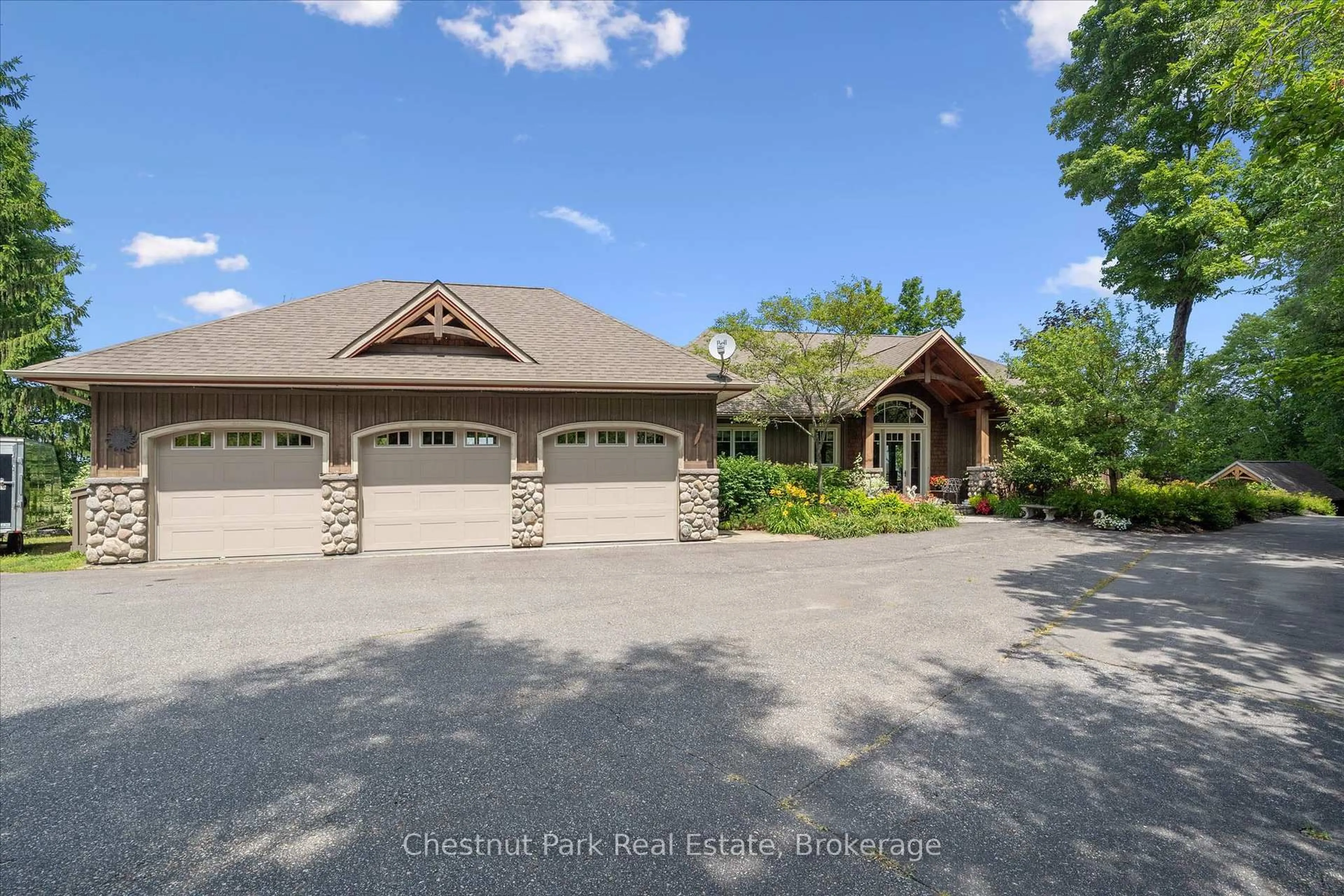 A pic from outside/outdoor area/front of a property/back of a property/a pic from drone, water/lake/river/ocean view for 904 Aspdin Rd, Huntsville Ontario P1H 2J2