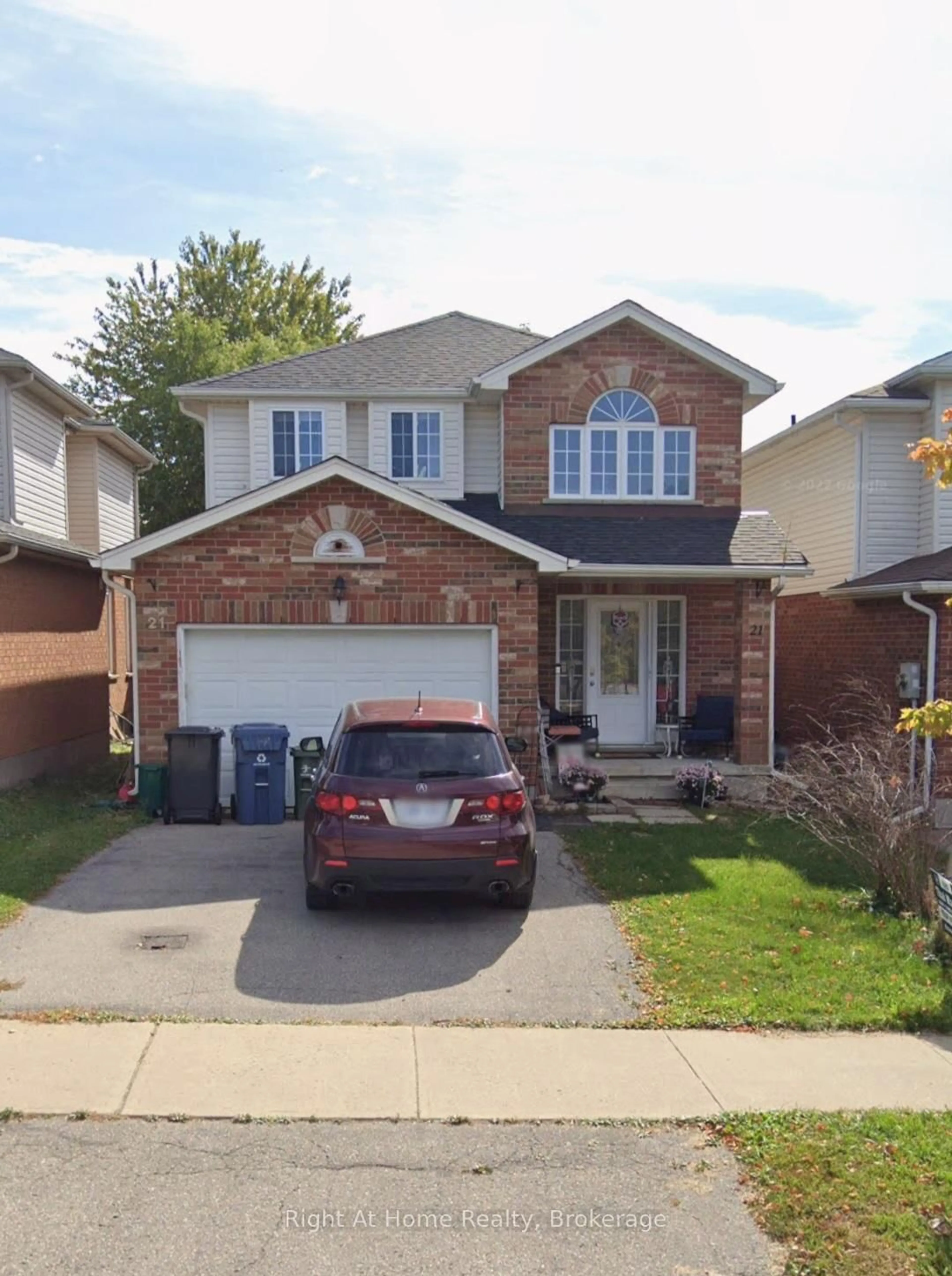 Home with brick exterior material, street for 21 Fuller Dr, Guelph Ontario N1E 7J4