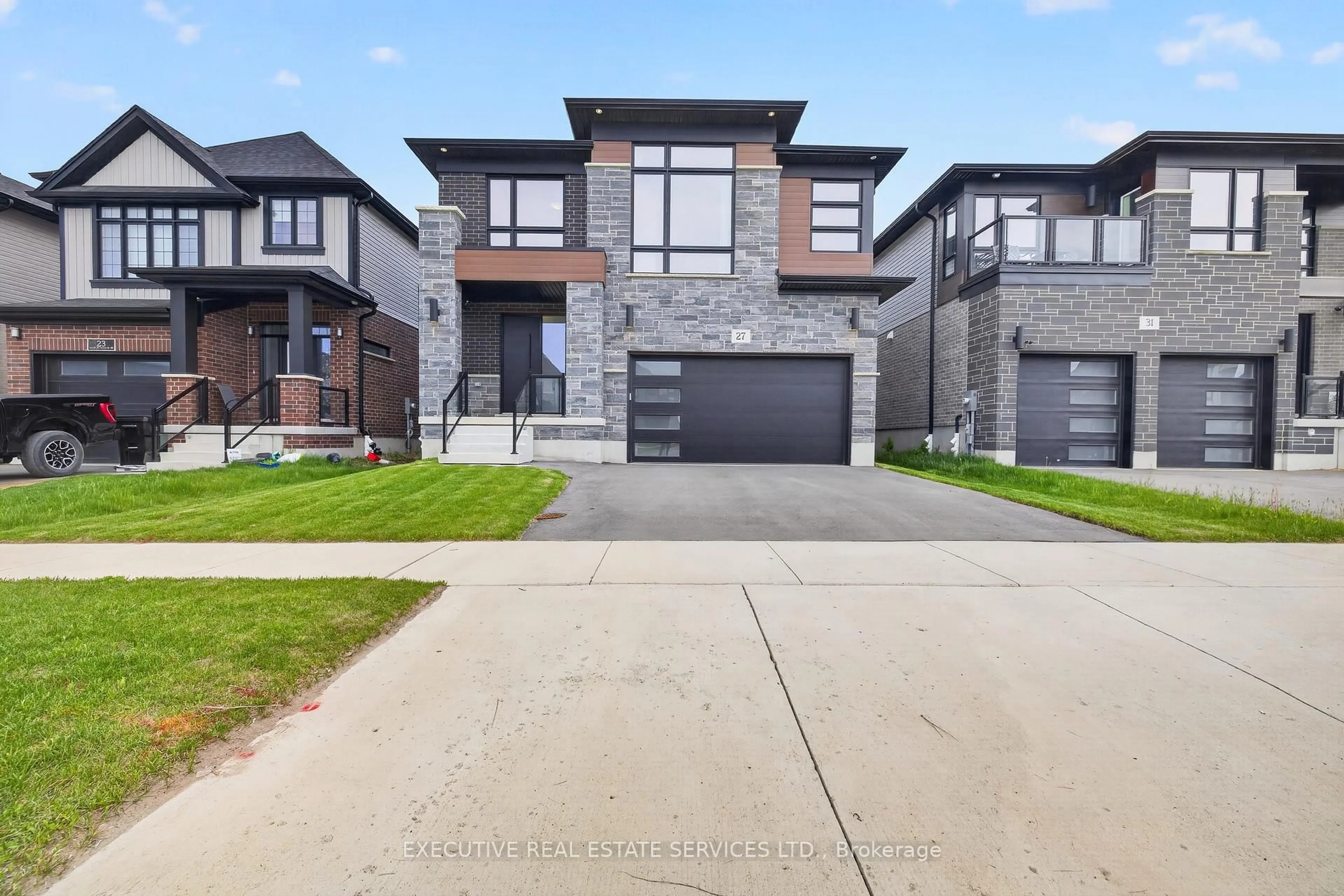 Home with brick exterior material, street for 27 Jacob Detweiller Dr, Kitchener Ontario N2P 0K7