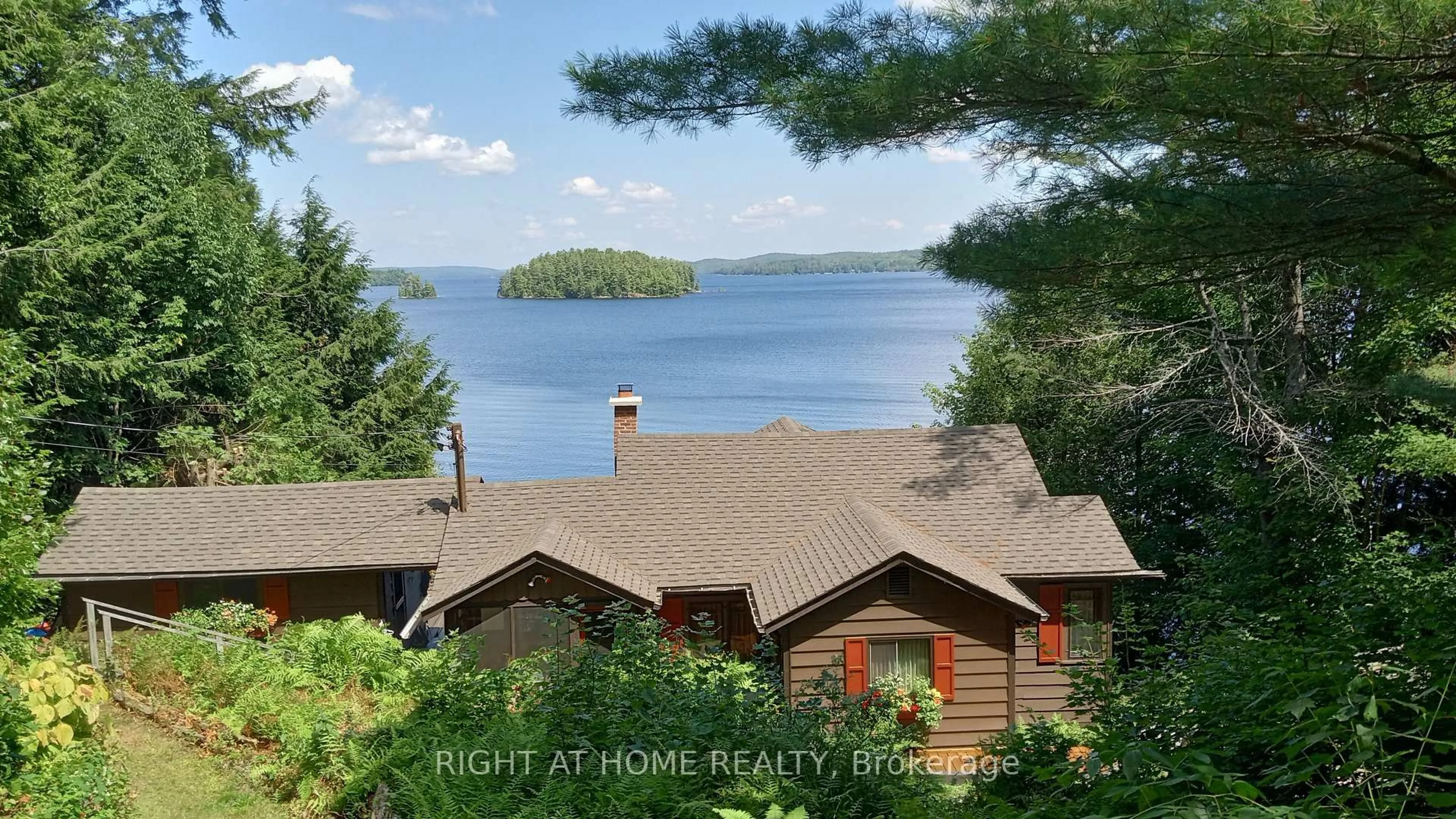 A pic from outside/outdoor area/front of a property/back of a property/a pic from drone, water/lake/river/ocean view for 1159 Schufelt Rd, Lake of Bays Ontario P0B 1A0