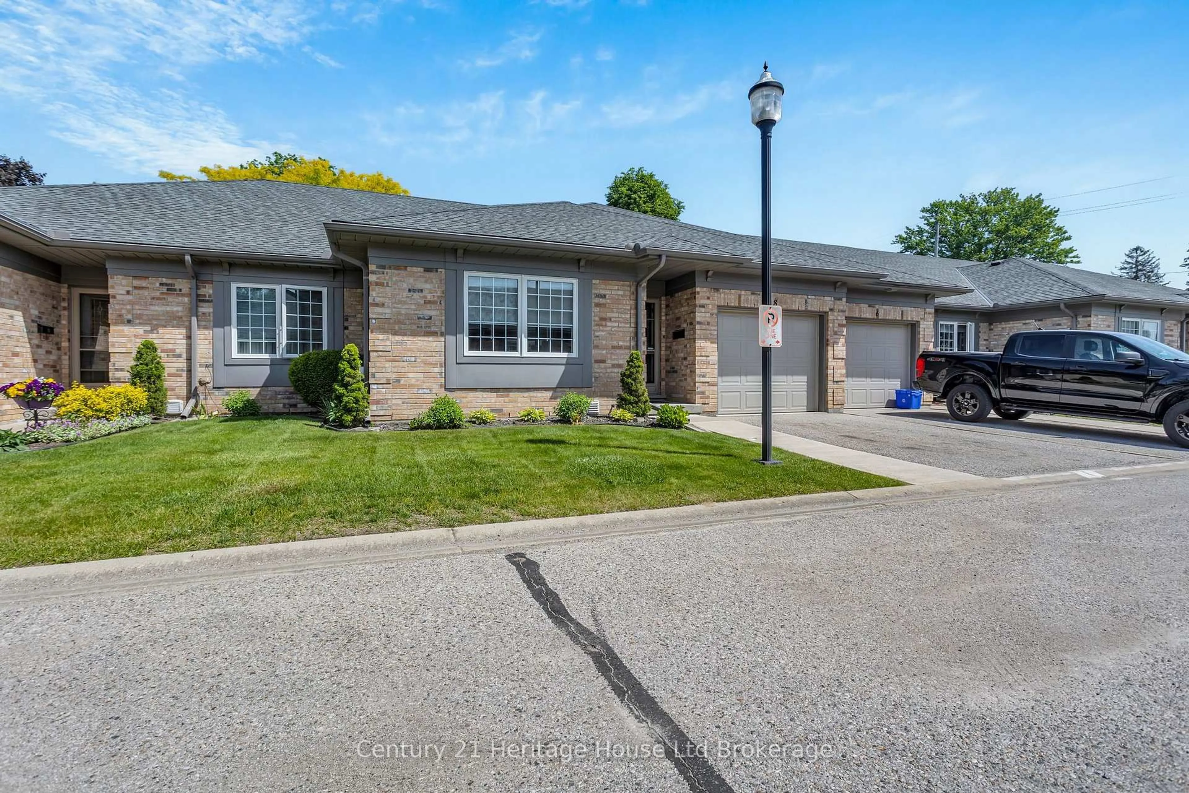 Home with brick exterior material, street for 105 King St #8, Tillsonburg Ontario N4G 5V1