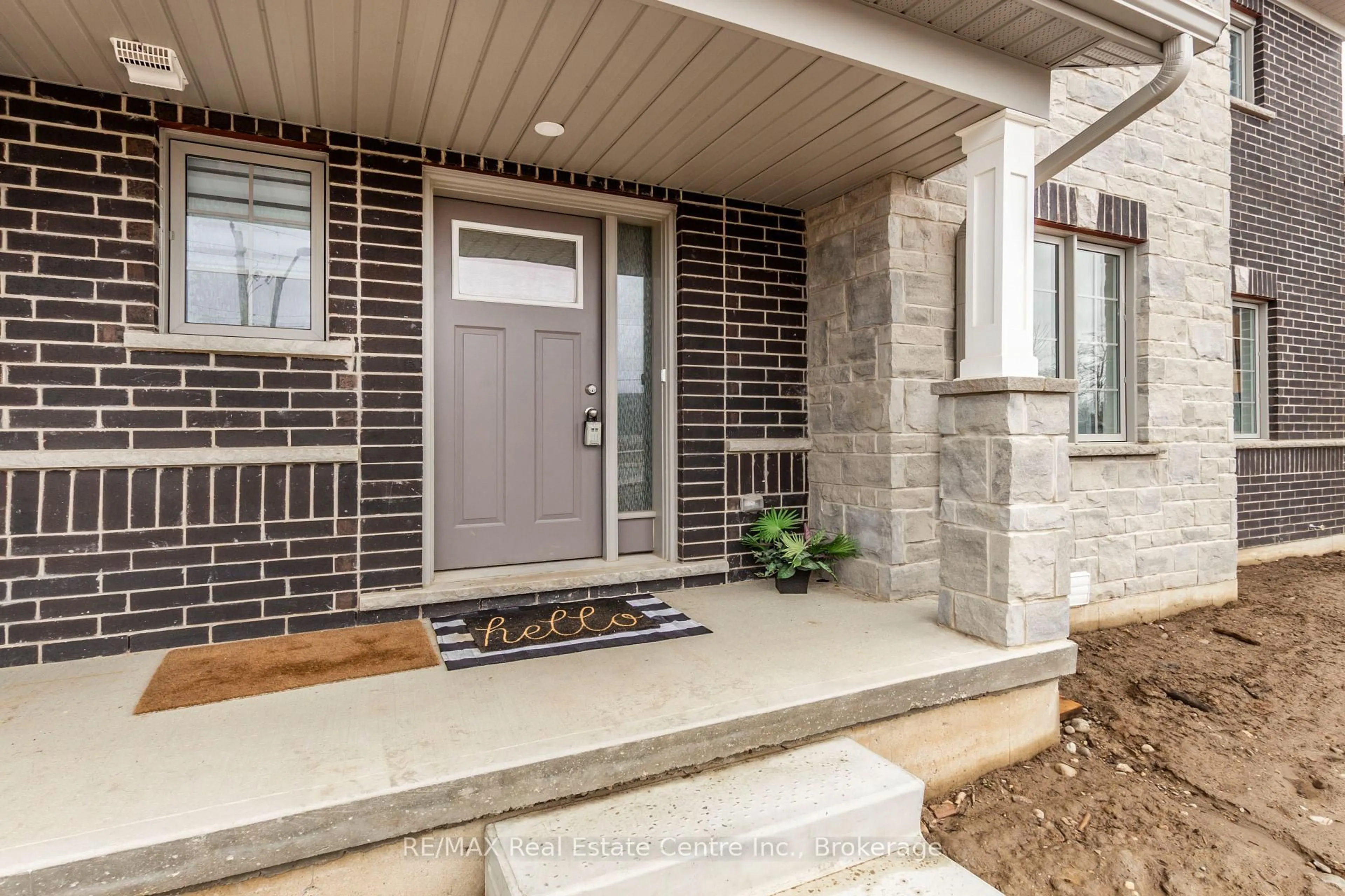 Home with brick exterior material, street for 1 West Mill St #1, North Dumfries Ontario N0B 1E0