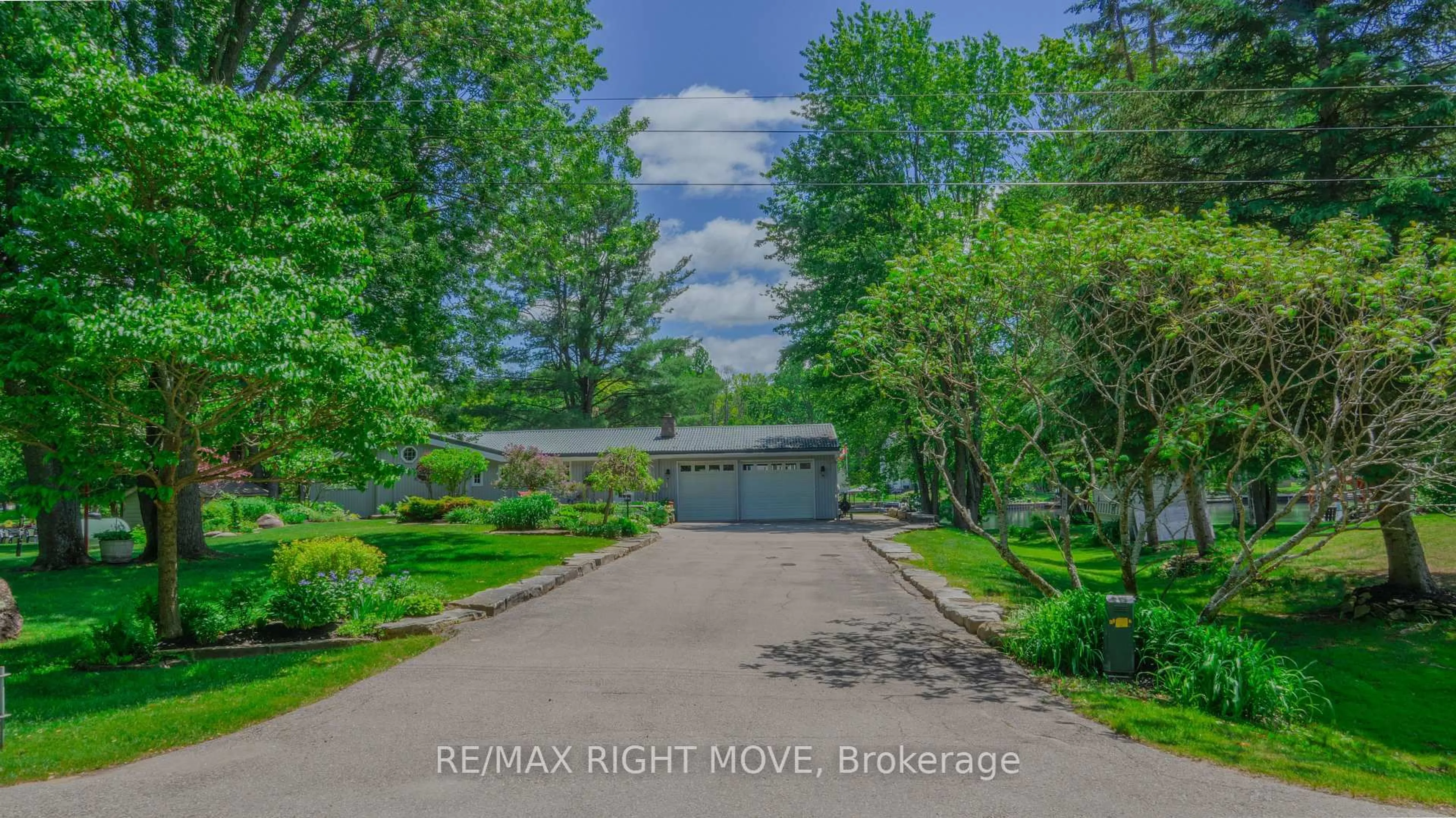 A pic from outside/outdoor area/front of a property/back of a property/a pic from drone, water/lake/river/ocean view for 1092 Cowbell Lane, Gravenhurst Ontario P0E 1N0