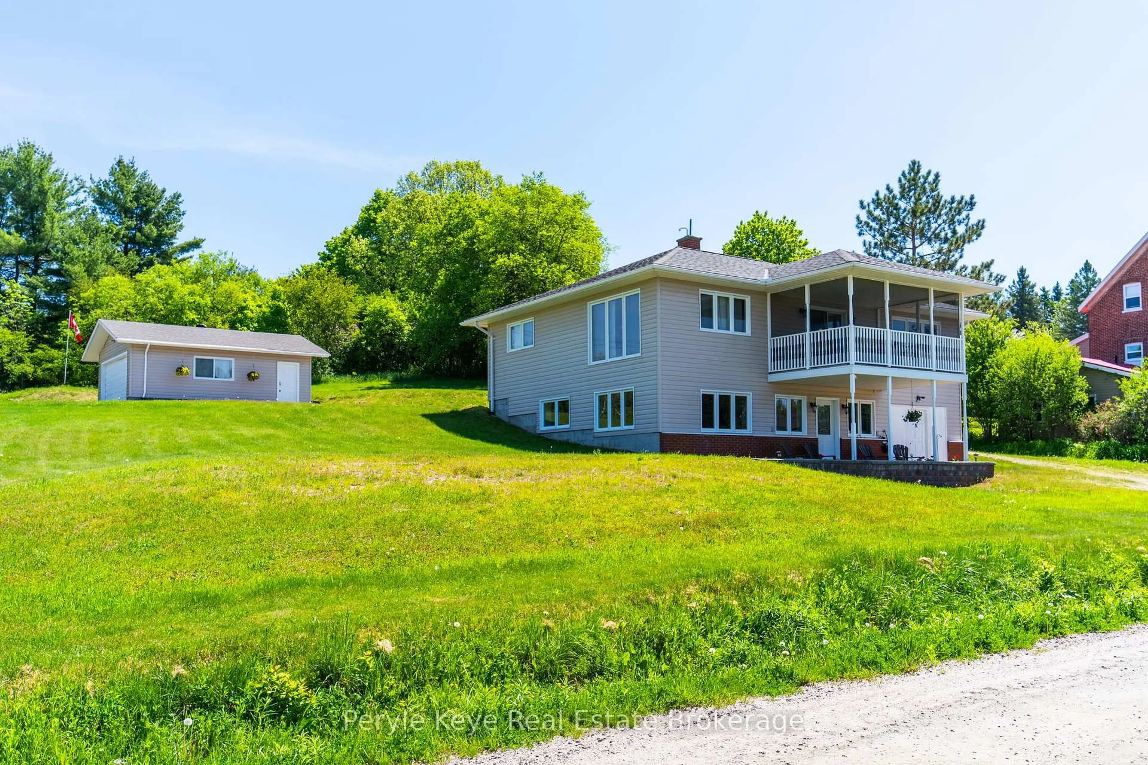 A pic from outside/outdoor area/front of a property/back of a property/a pic from drone, water/lake/river/ocean view for 81 Miller St, Magnetawan Ontario P0A 1P0