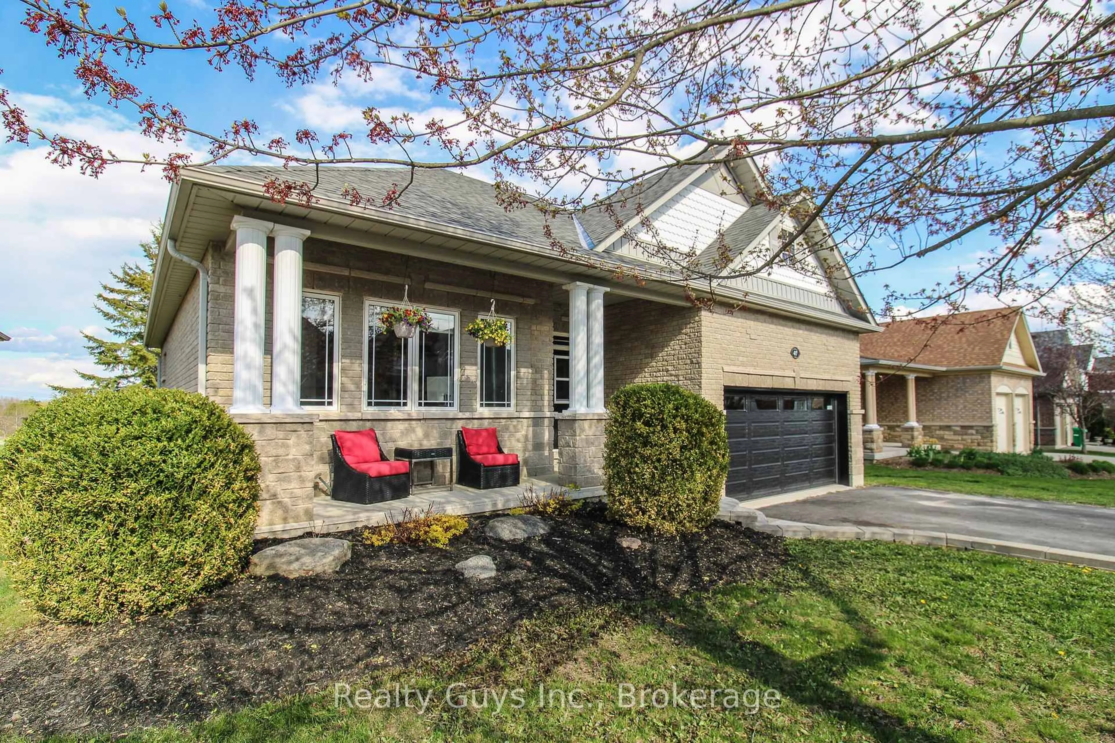 Home with brick exterior material, street for 407 Carriage Lane, Peterborough Ontario K9L 2A5