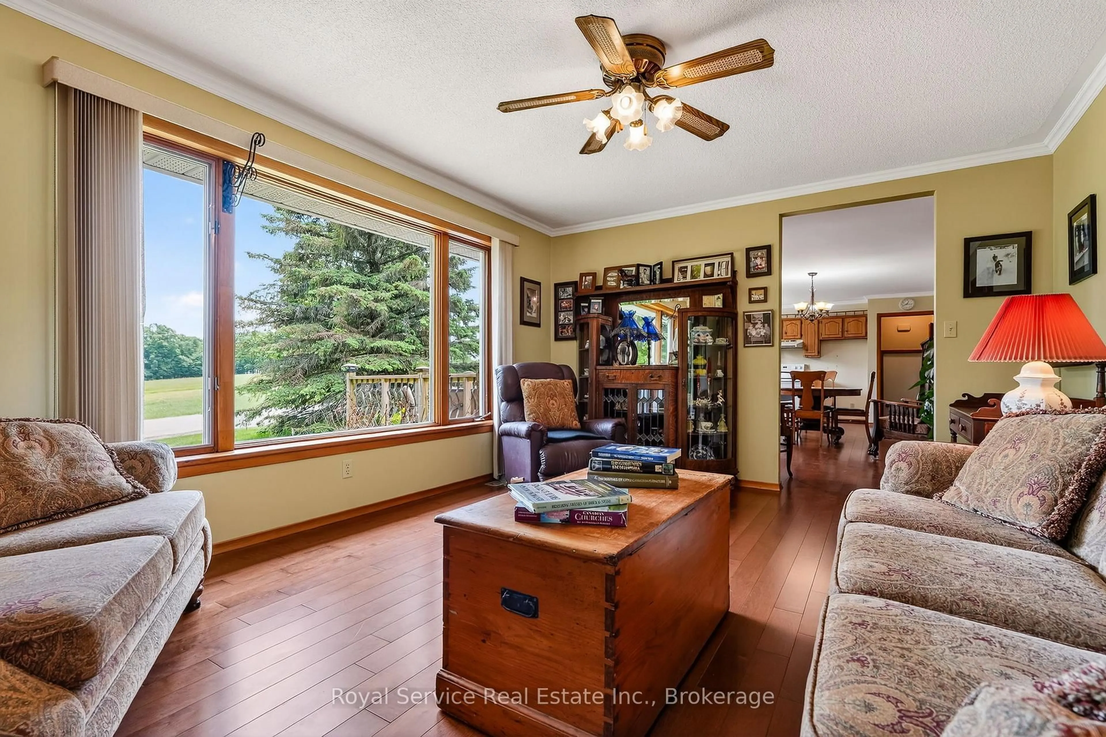 Living room with furniture, wood/laminate floor for 12802 County Rd 24 Rd, Alnwick/Haldimand Ontario K0K 2X0