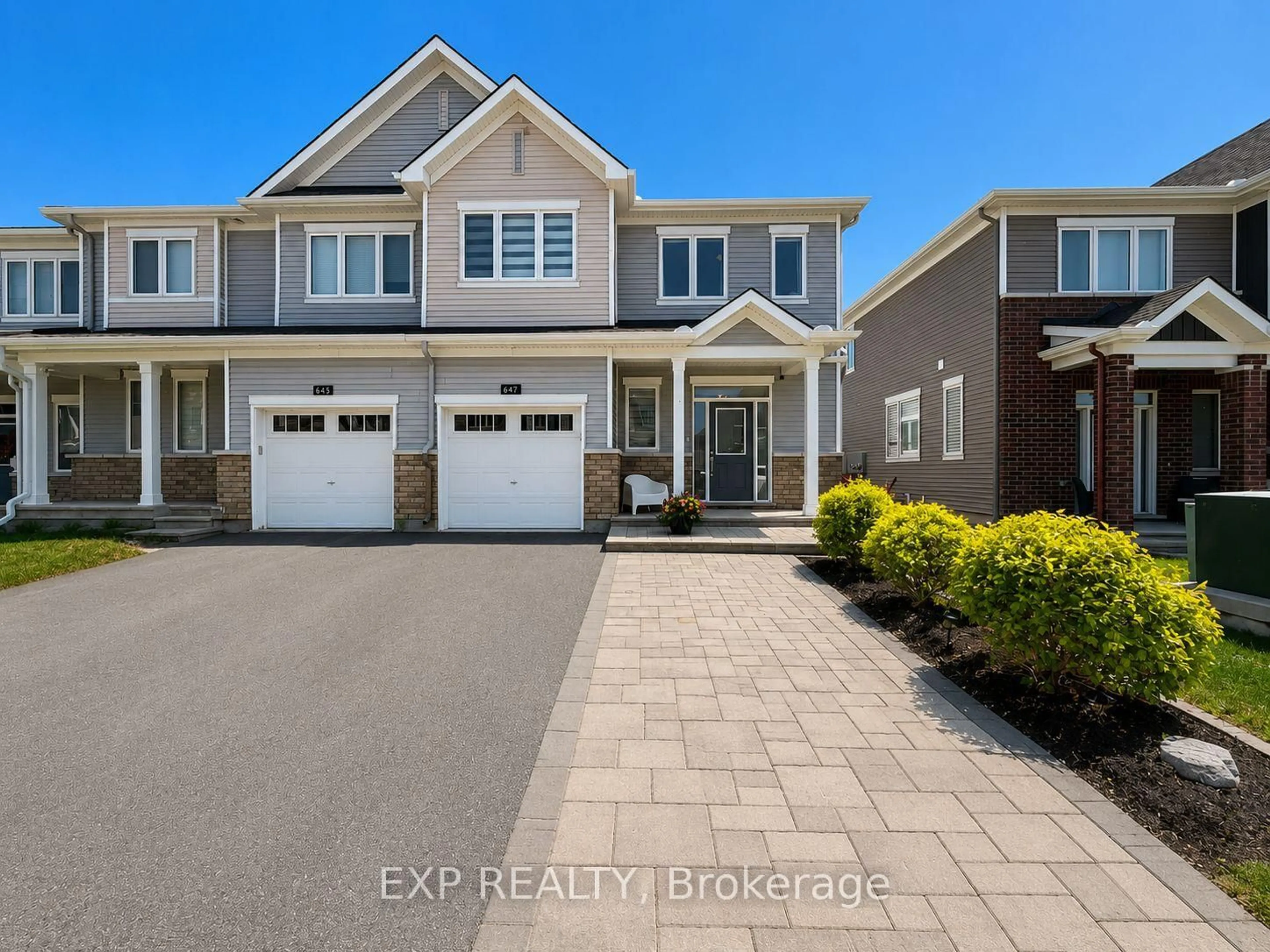 Home with vinyl exterior material, street for 647 Crevier Walk, Ottawa Ontario K1W 0M7
