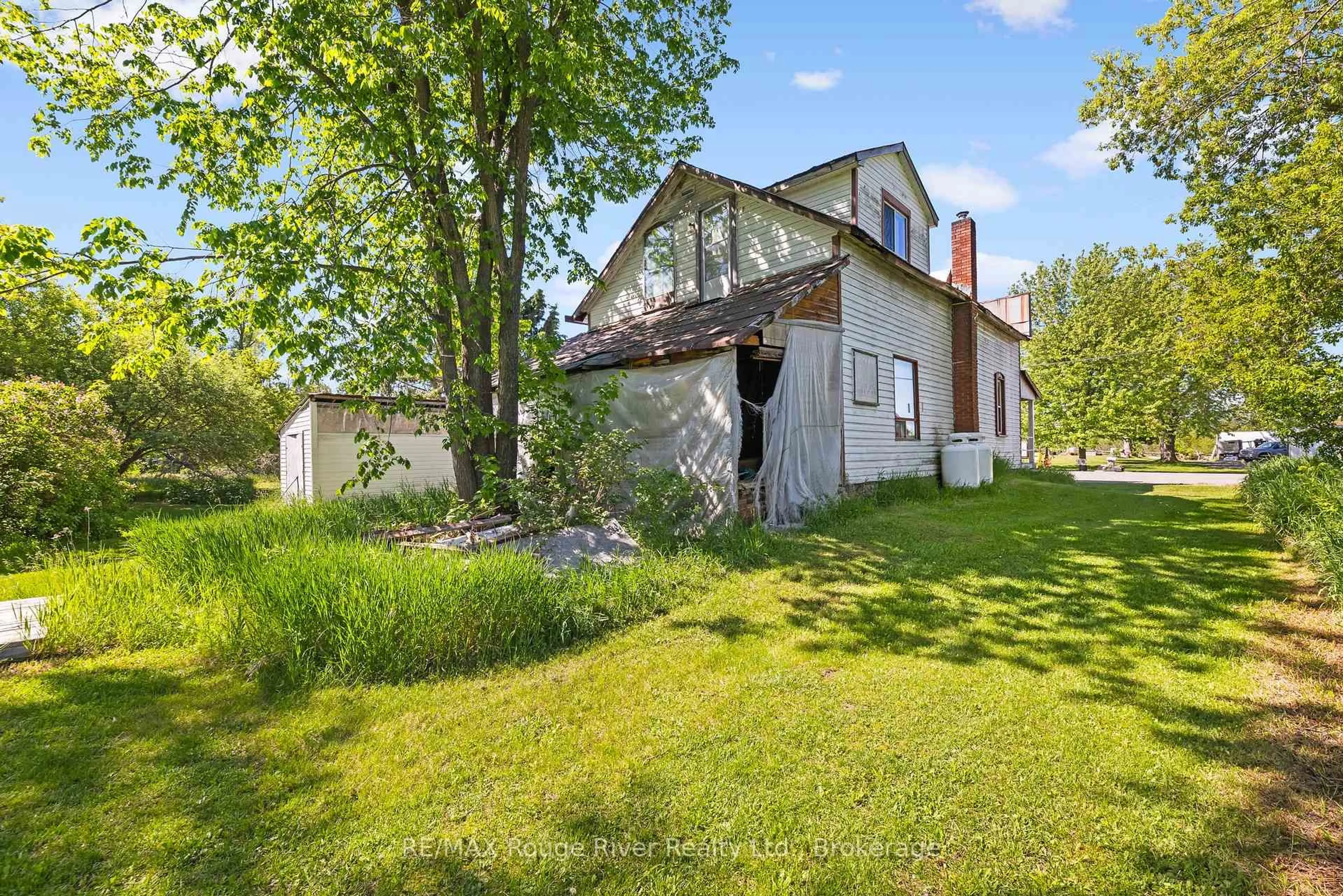 A pic from outside/outdoor area/front of a property/back of a property/a pic from drone, street for 2407 Indian River Line, Otonabee-South Monaghan Ontario K0L 2B0