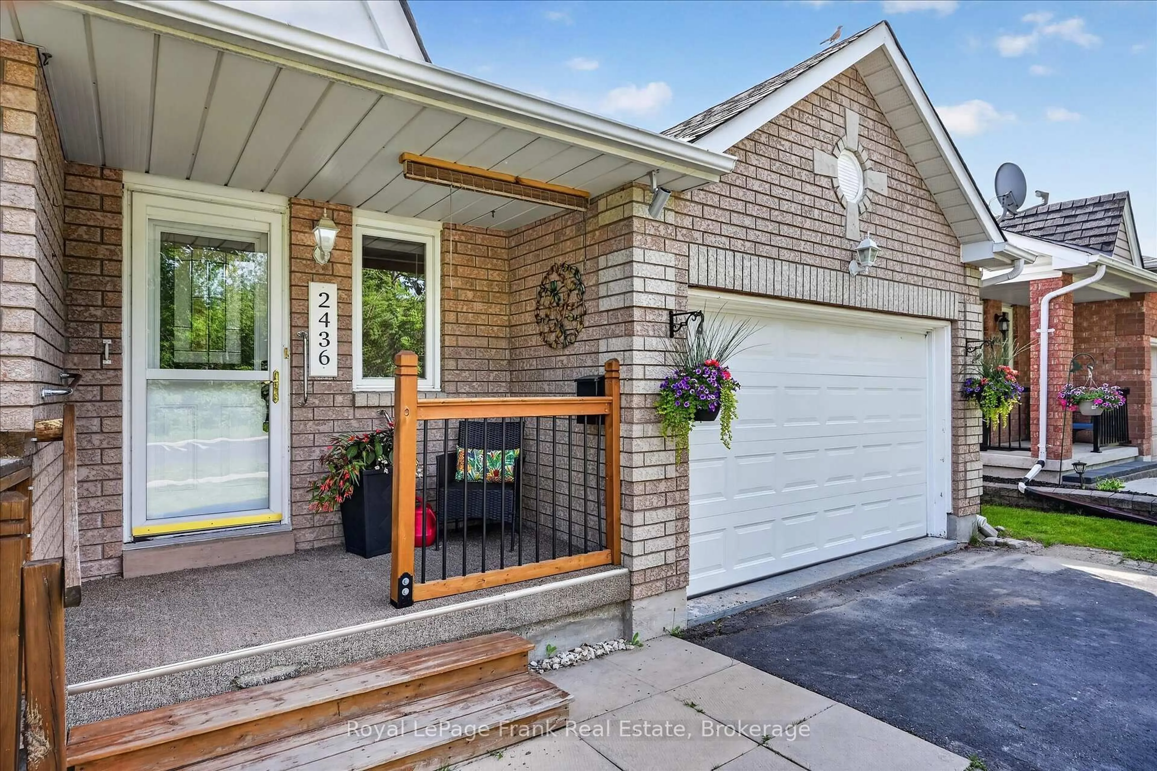Home with brick exterior material, street for 2436 Woodglade Blvd, Peterborough Ontario K9K 2K9