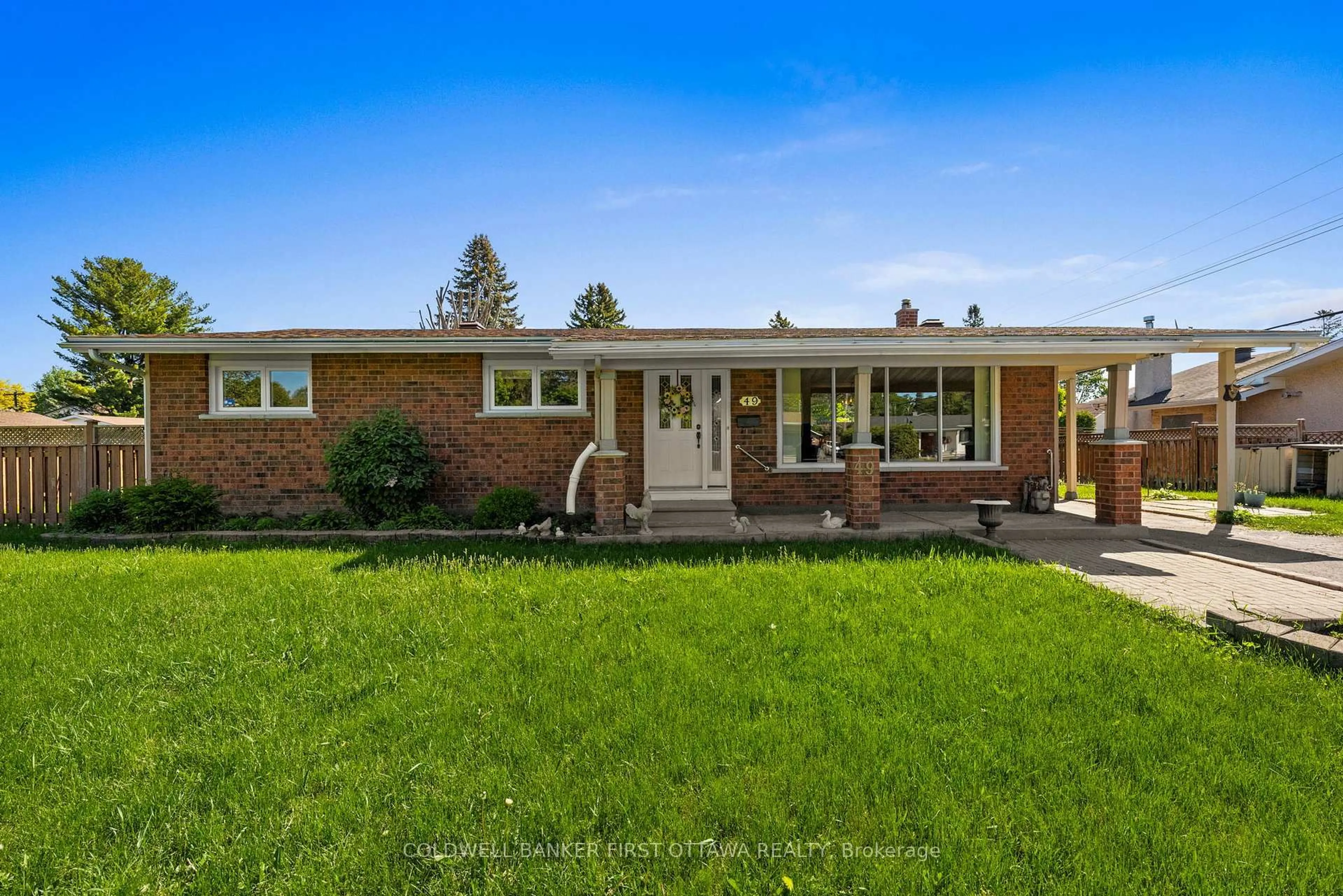 Home with brick exterior material, street for 49 Higwood Dr, Ottawa Ontario K2E 5K9