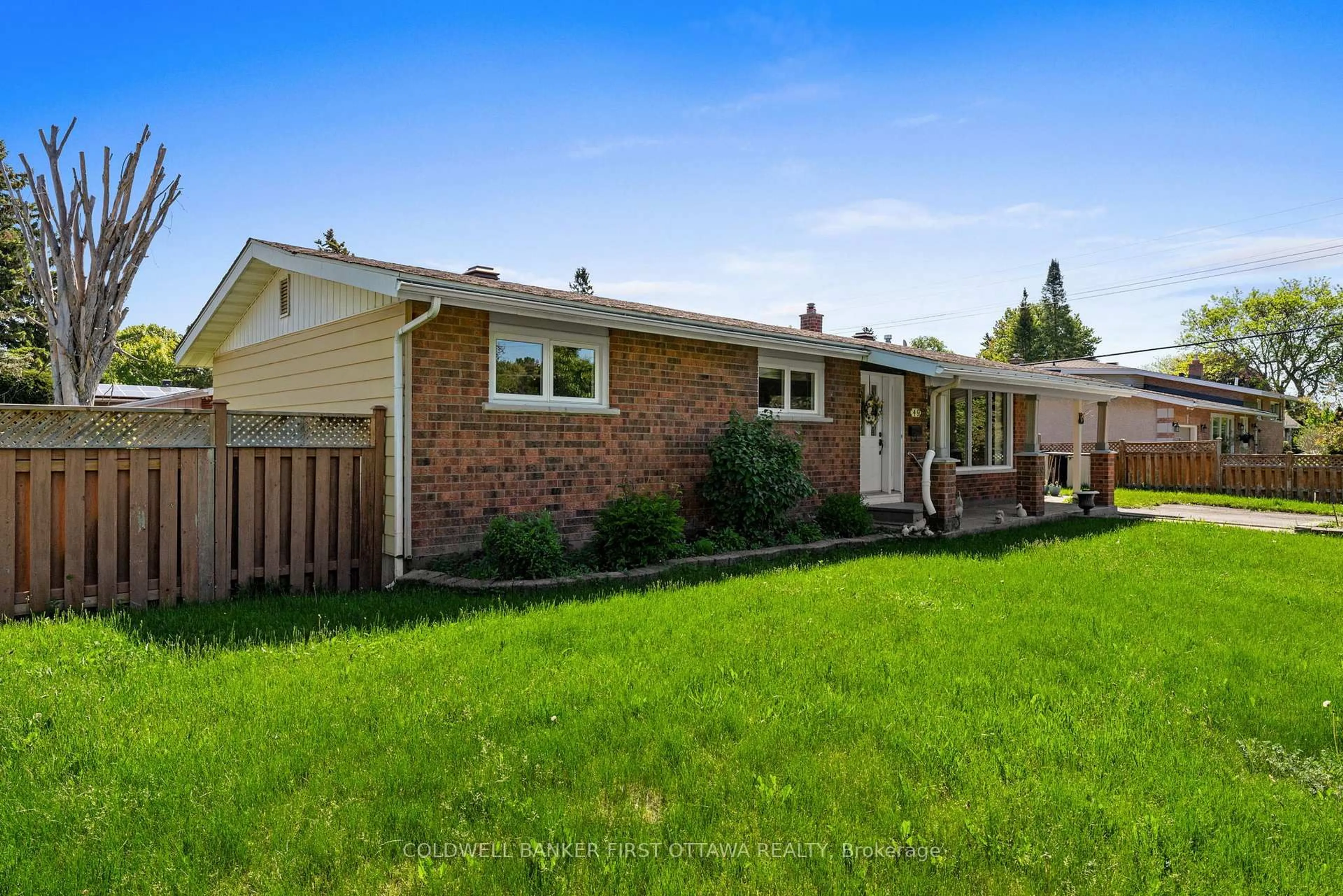 Home with vinyl exterior material, street for 49 Higwood Dr, Ottawa Ontario K2E 5K9