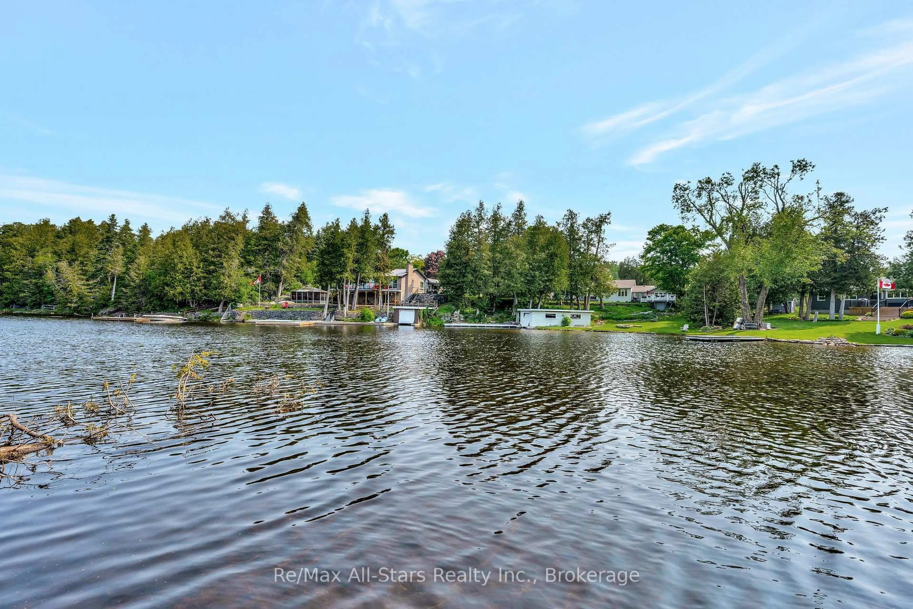 A pic from outside/outdoor area/front of a property/back of a property/a pic from drone, water/lake/river/ocean view for 14 Wychwood Dr, Kawartha Lakes Ontario K0M 1N0