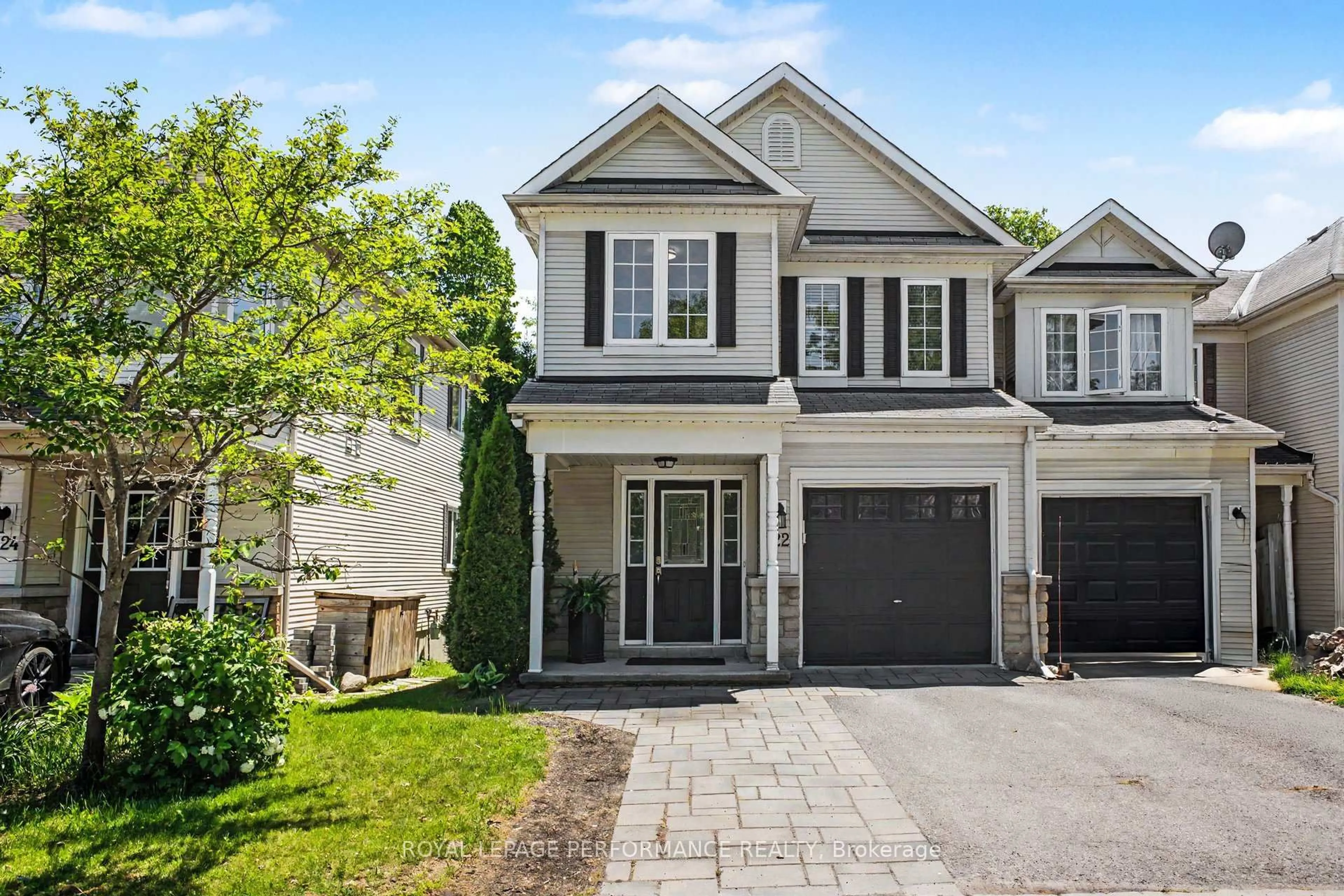 Home with brick exterior material, street for 122 Rustwood Private, Ottawa Ontario K2J 5L5