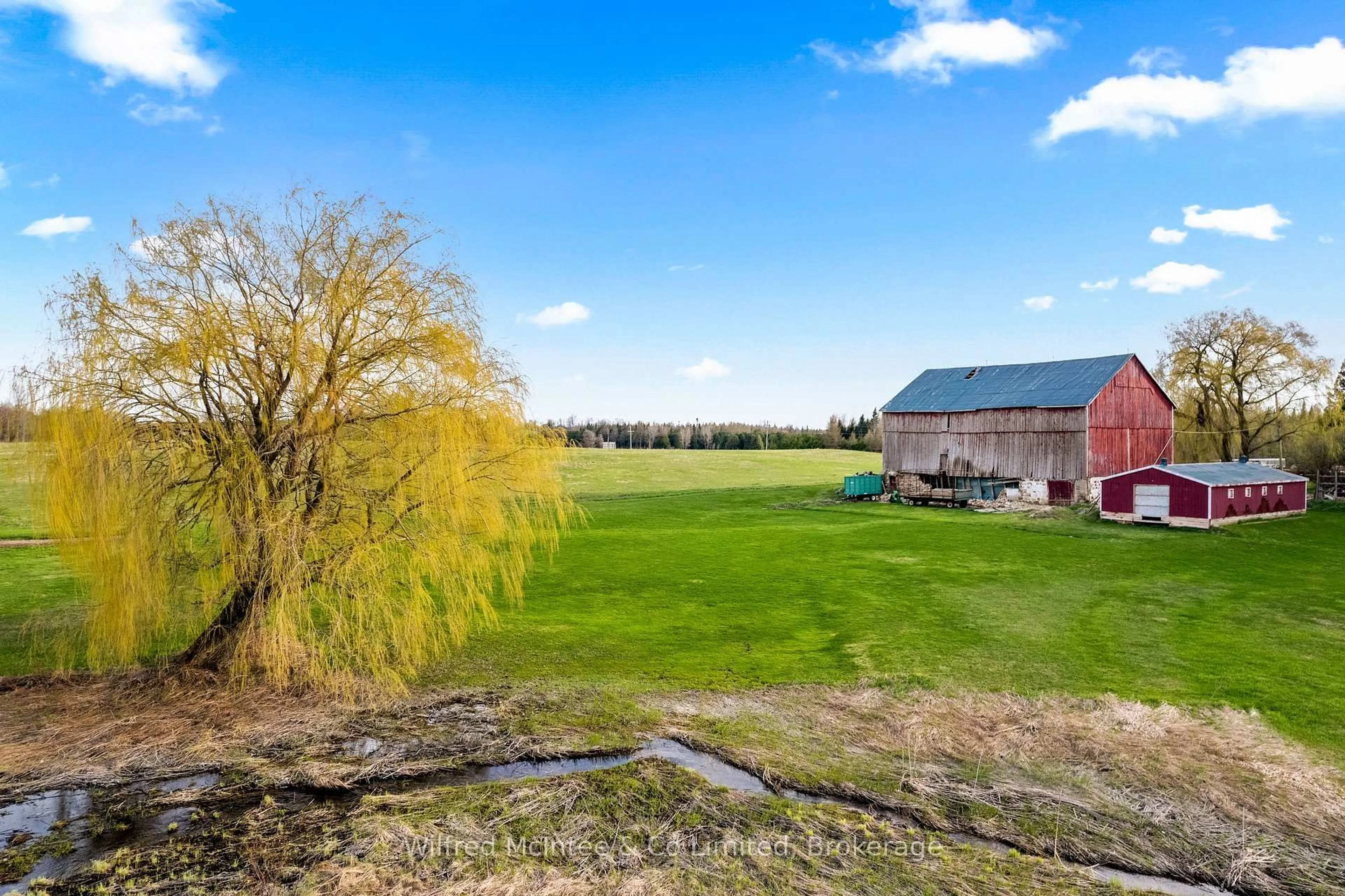 A pic from outside/outdoor area/front of a property/back of a property/a pic from drone, water/lake/river/ocean view for 312513 HWY 6, Southgate Ontario N0G 1R0