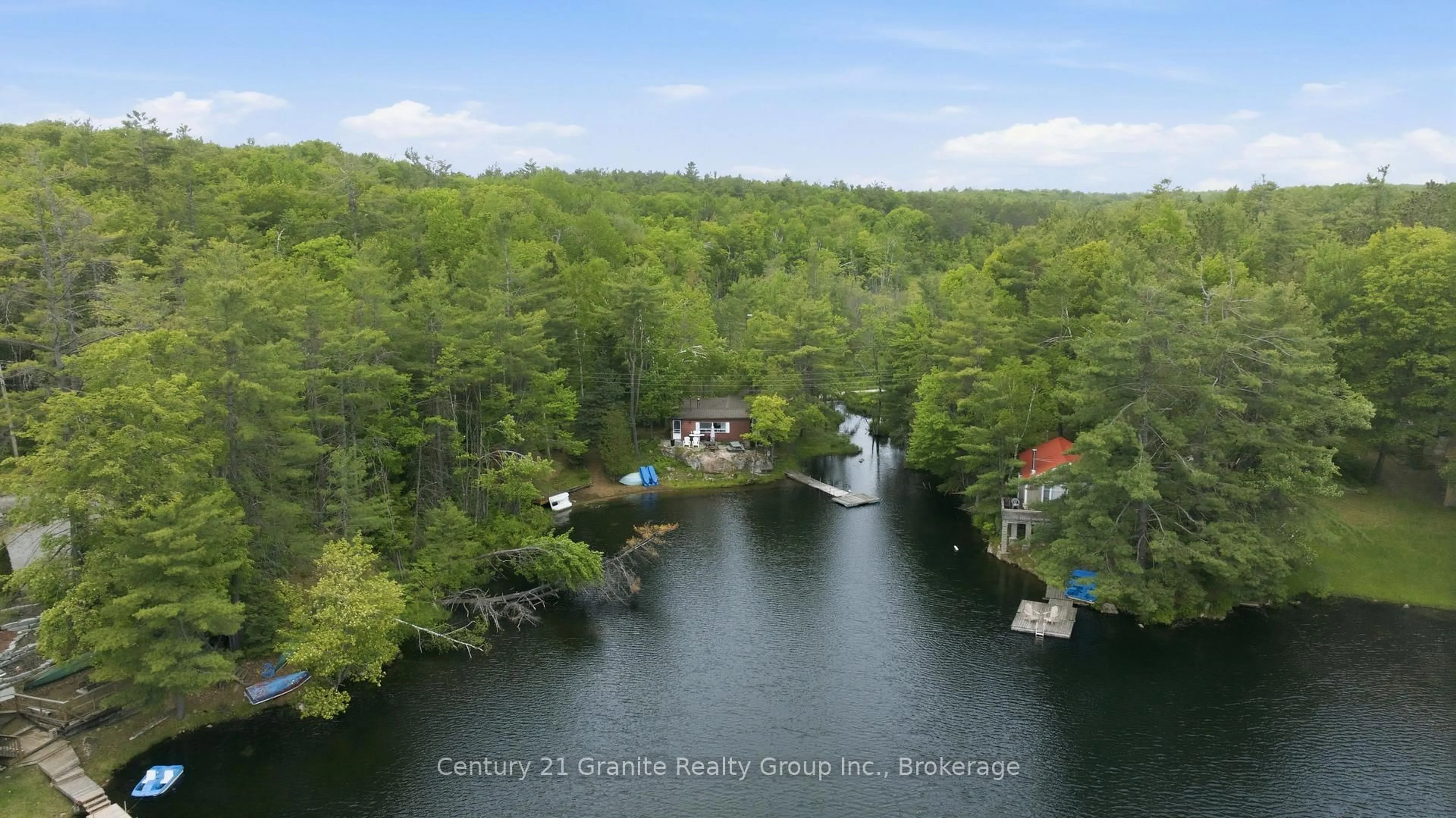 A pic from outside/outdoor area/front of a property/back of a property/a pic from drone, water/lake/river/ocean view for 1427 Spar Lake Rd, Minden Hills Ontario K0M 2K0