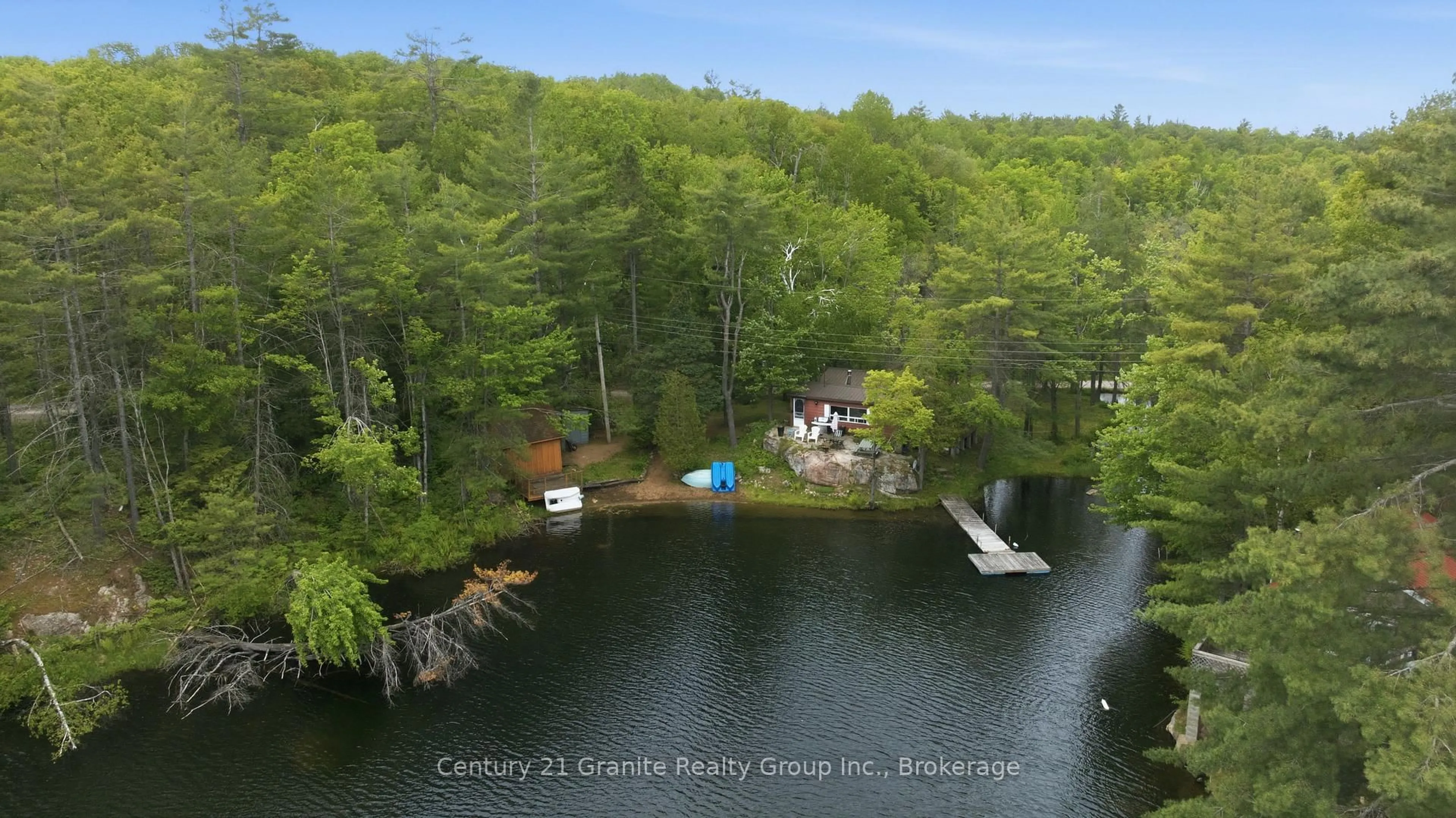 A pic from outside/outdoor area/front of a property/back of a property/a pic from drone, water/lake/river/ocean view for 1427 Spar Lake Rd, Minden Hills Ontario K0M 2K0