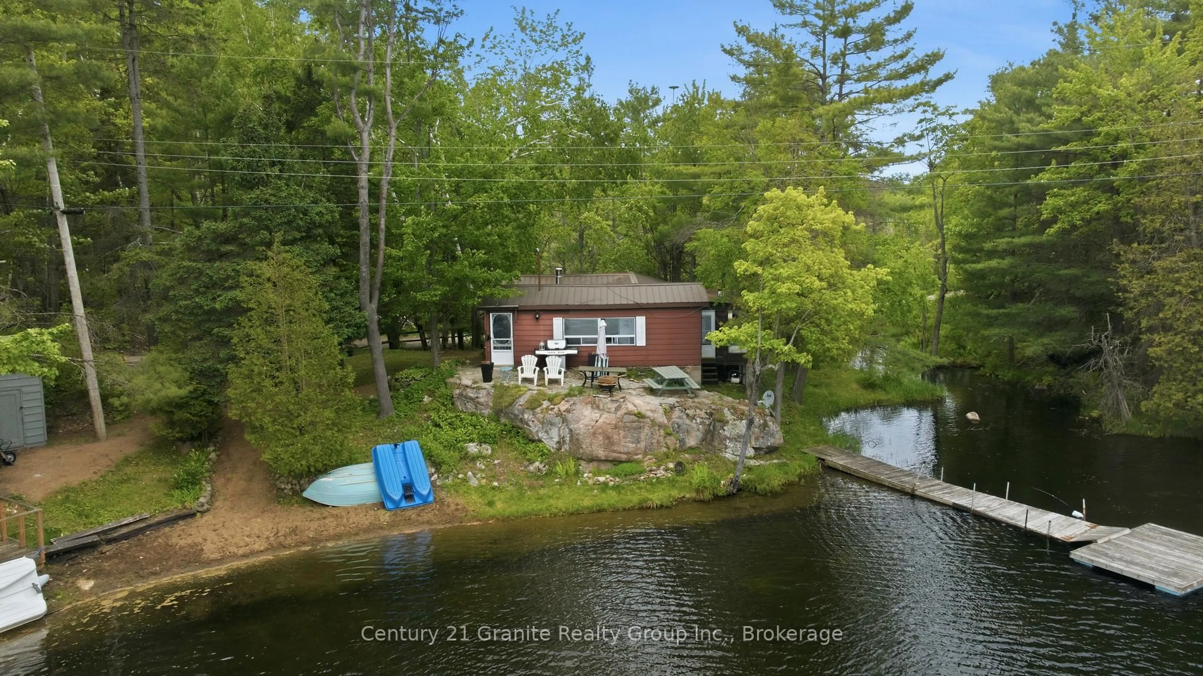A pic from outside/outdoor area/front of a property/back of a property/a pic from drone, water/lake/river/ocean view for 1427 Spar Lake Rd, Minden Hills Ontario K0M 2K0