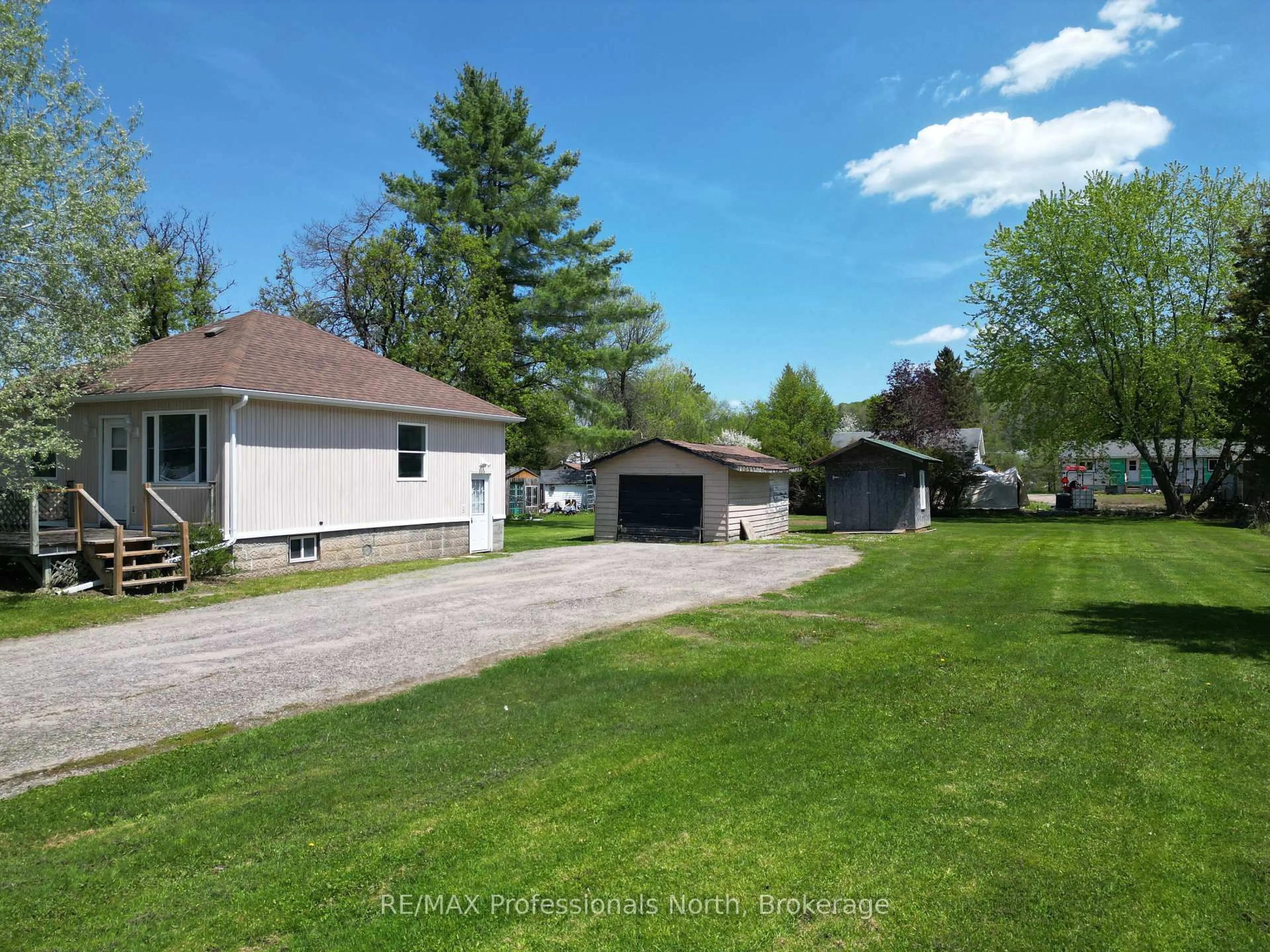 A pic from outside/outdoor area/front of a property/back of a property/a pic from drone, street for 14 Chandos St, Minden Hills Ontario K0M 2K0