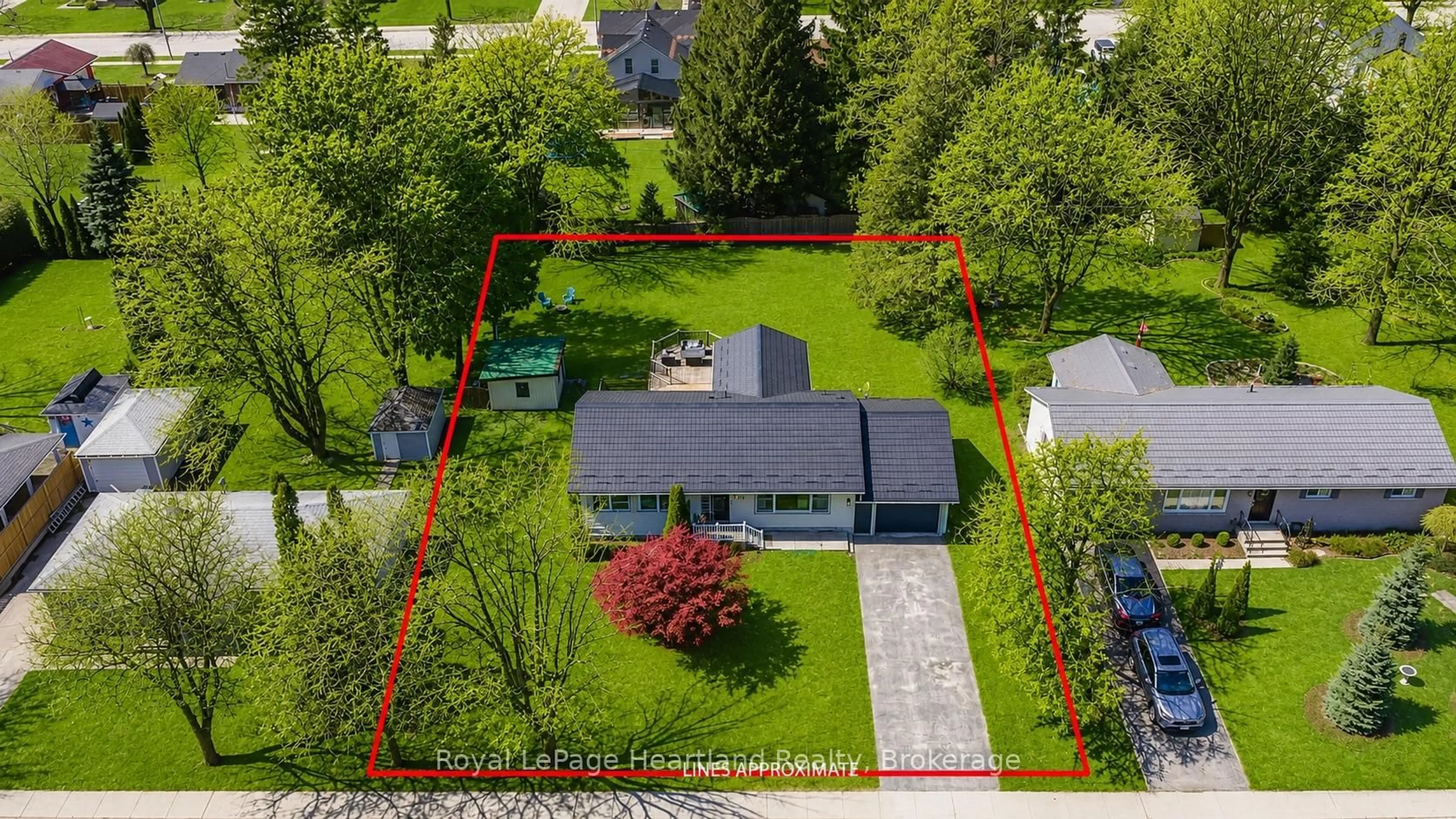 A pic from outside/outdoor area/front of a property/back of a property/a pic from drone, street for 77 Chalk St, Huron East Ontario N0K 1W0