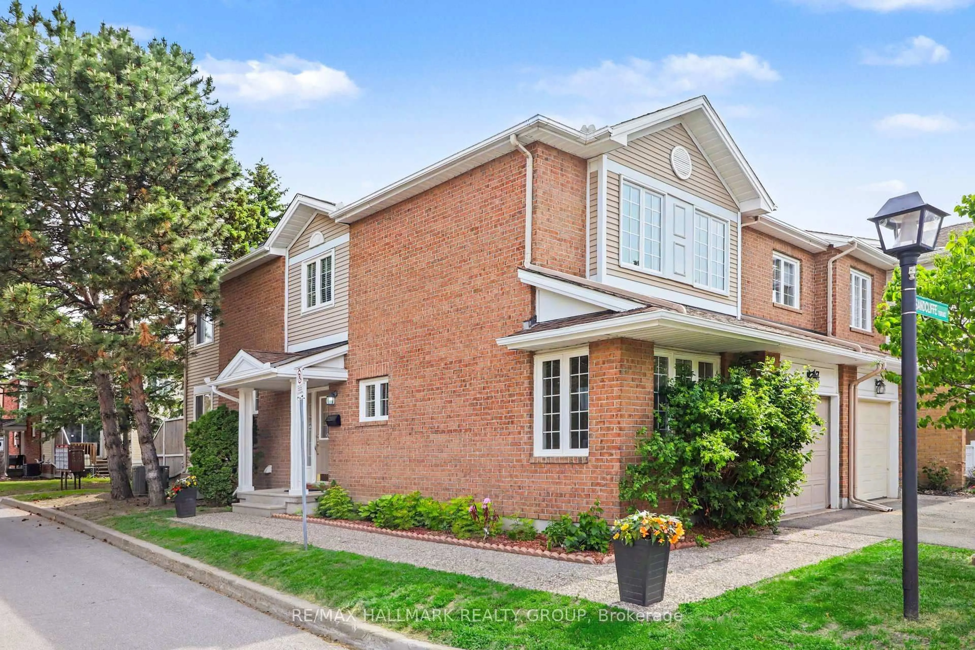 Home with brick exterior material, street for 27 Sandcliffe Terr, Ottawa Ontario K2G 5Y2