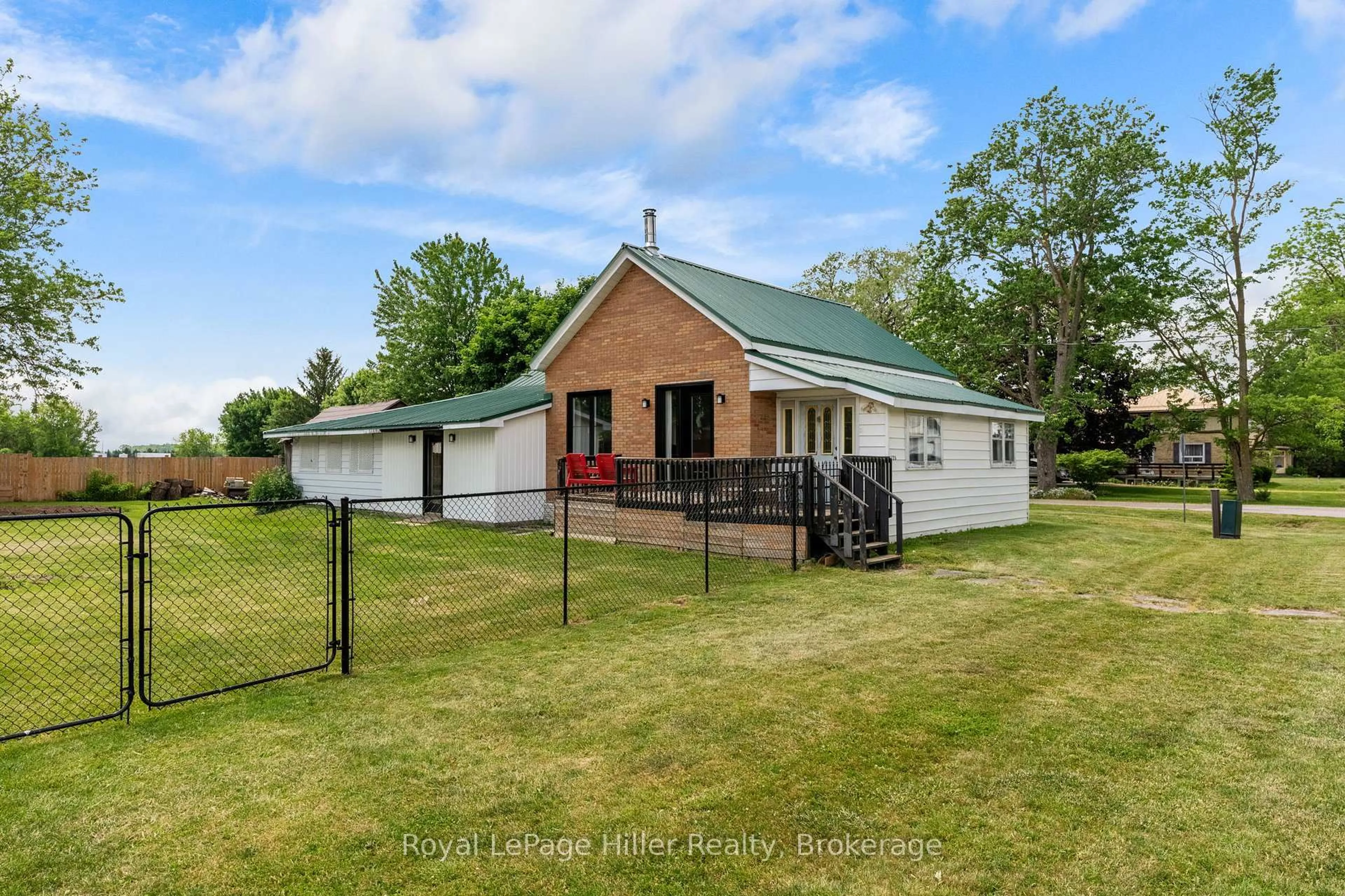 A pic from outside/outdoor area/front of a property/back of a property/a pic from drone, water/lake/river/ocean view for 125 Portland St, South Huron Ontario N0M 1K0