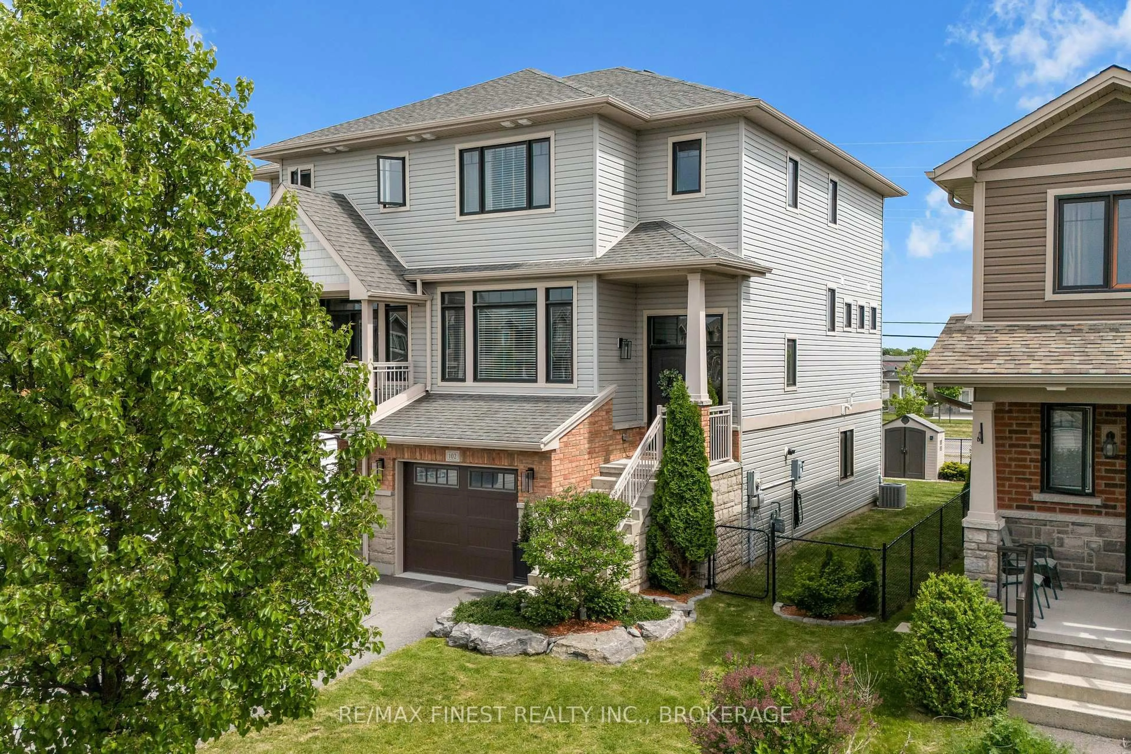 Home with brick exterior material, street for 102 Dr. Richard James Cres, Loyalist Ontario K7N 0B9