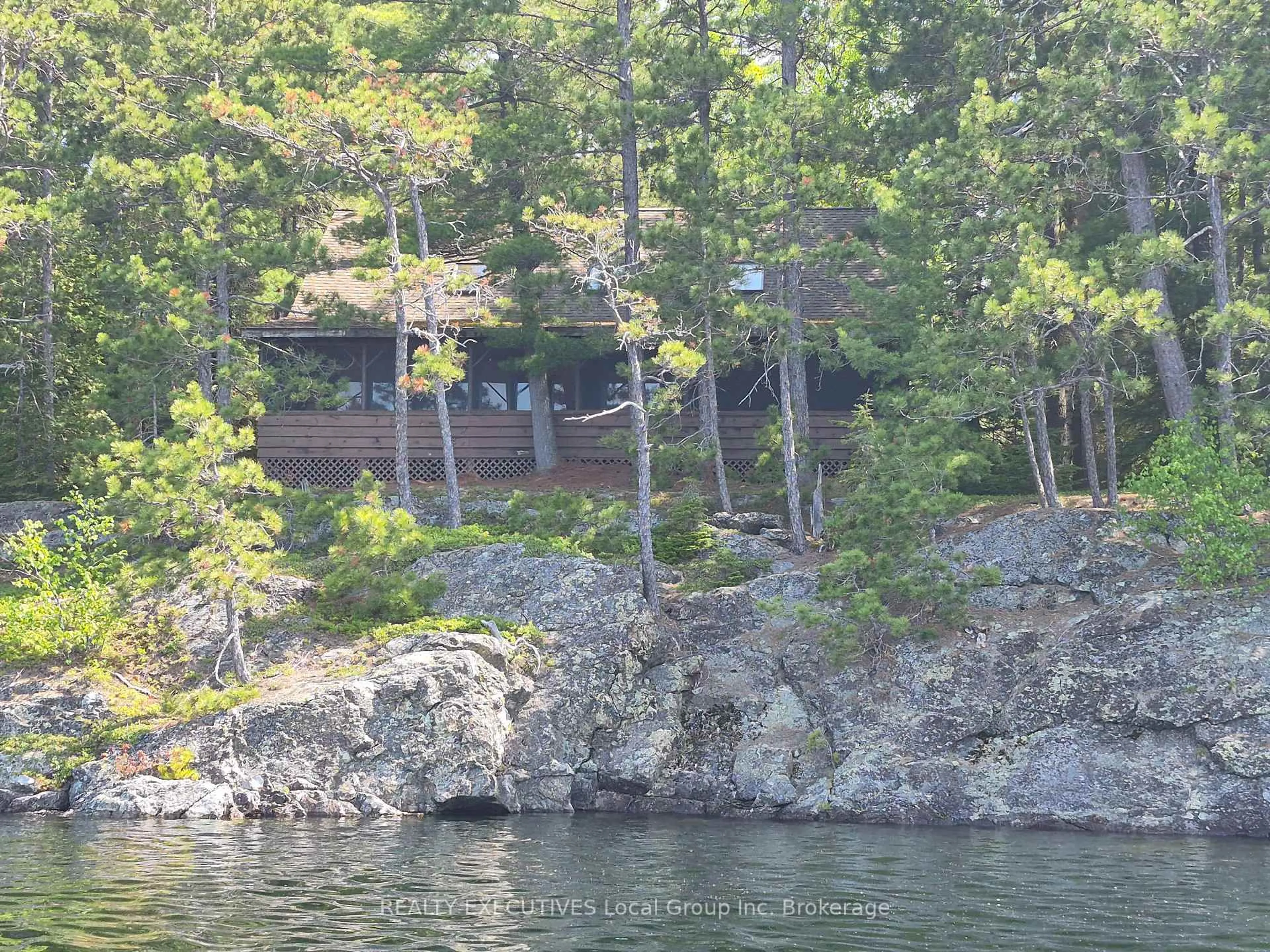 A pic from outside/outdoor area/front of a property/back of a property/a pic from drone, water/lake/river/ocean view for 758 Island, Temagami Ontario P0H 2H0