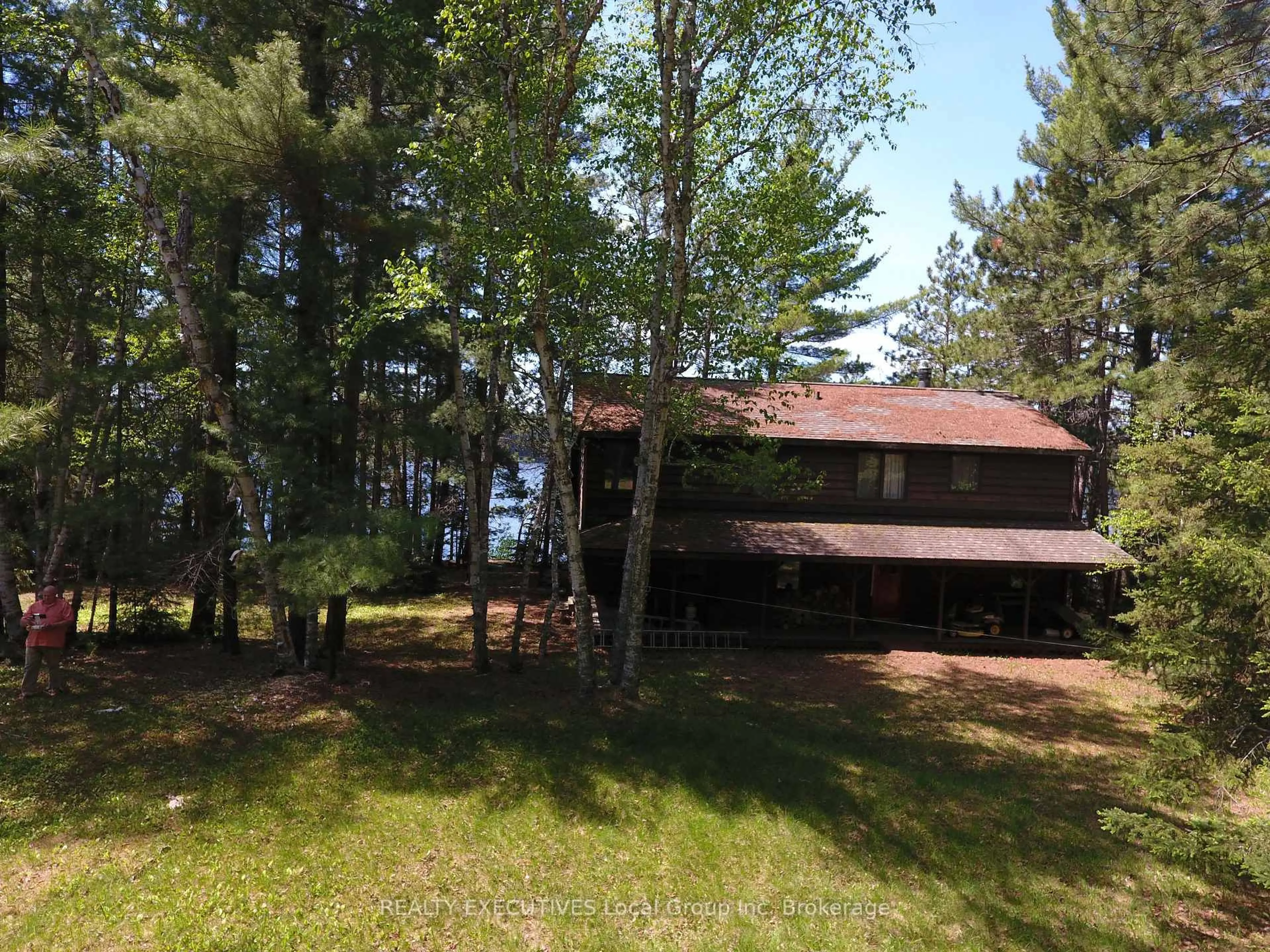 A pic from outside/outdoor area/front of a property/back of a property/a pic from drone, water/lake/river/ocean view for 758 Island, Temagami Ontario P0H 2H0
