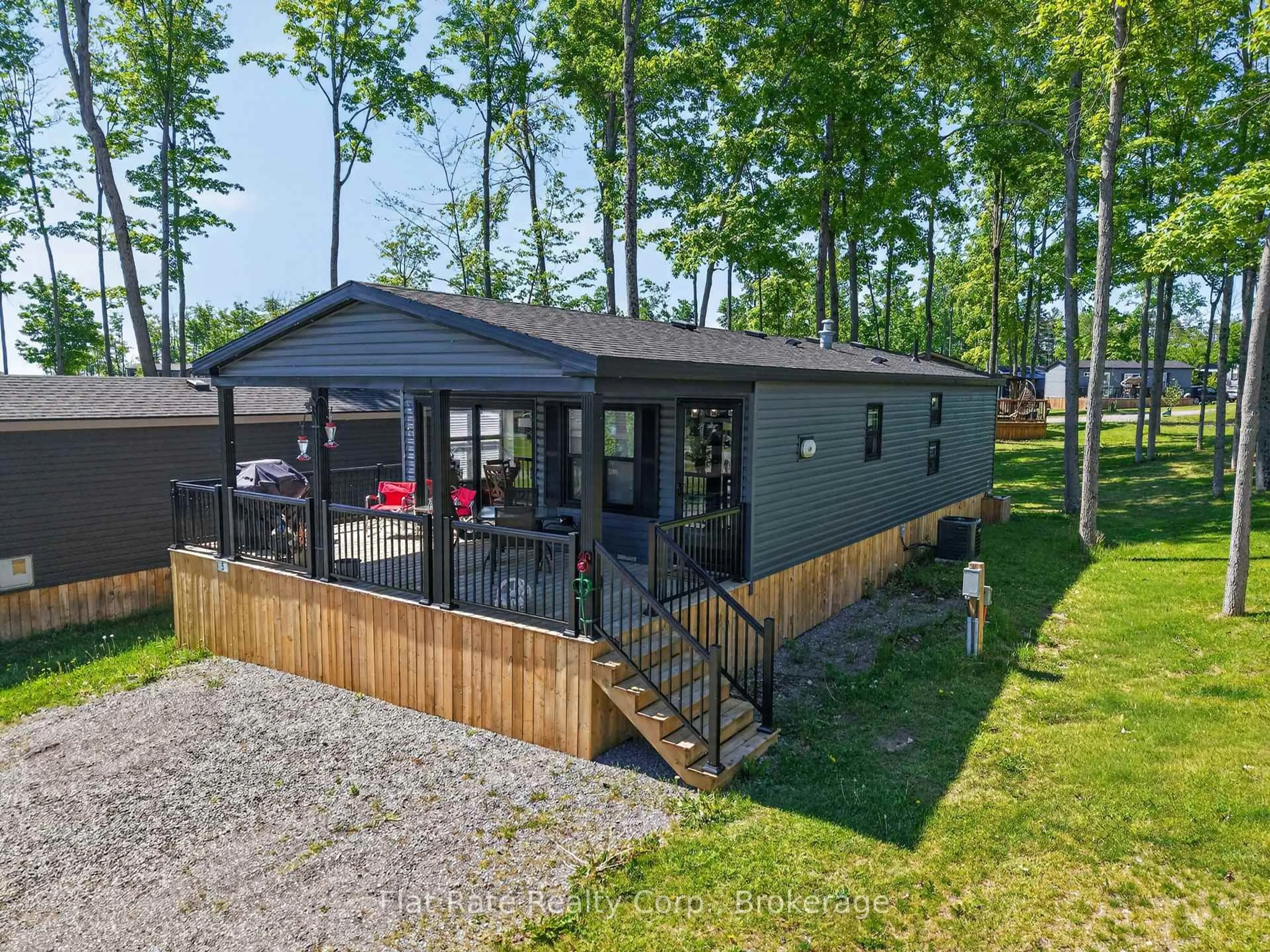 A pic from outside/outdoor area/front of a property/back of a property/a pic from drone, water/lake/river/ocean view for 1235 Villiers Line #ROSEDALE LANE #5, Otonabee-South Monaghan Ontario K0L 2G0