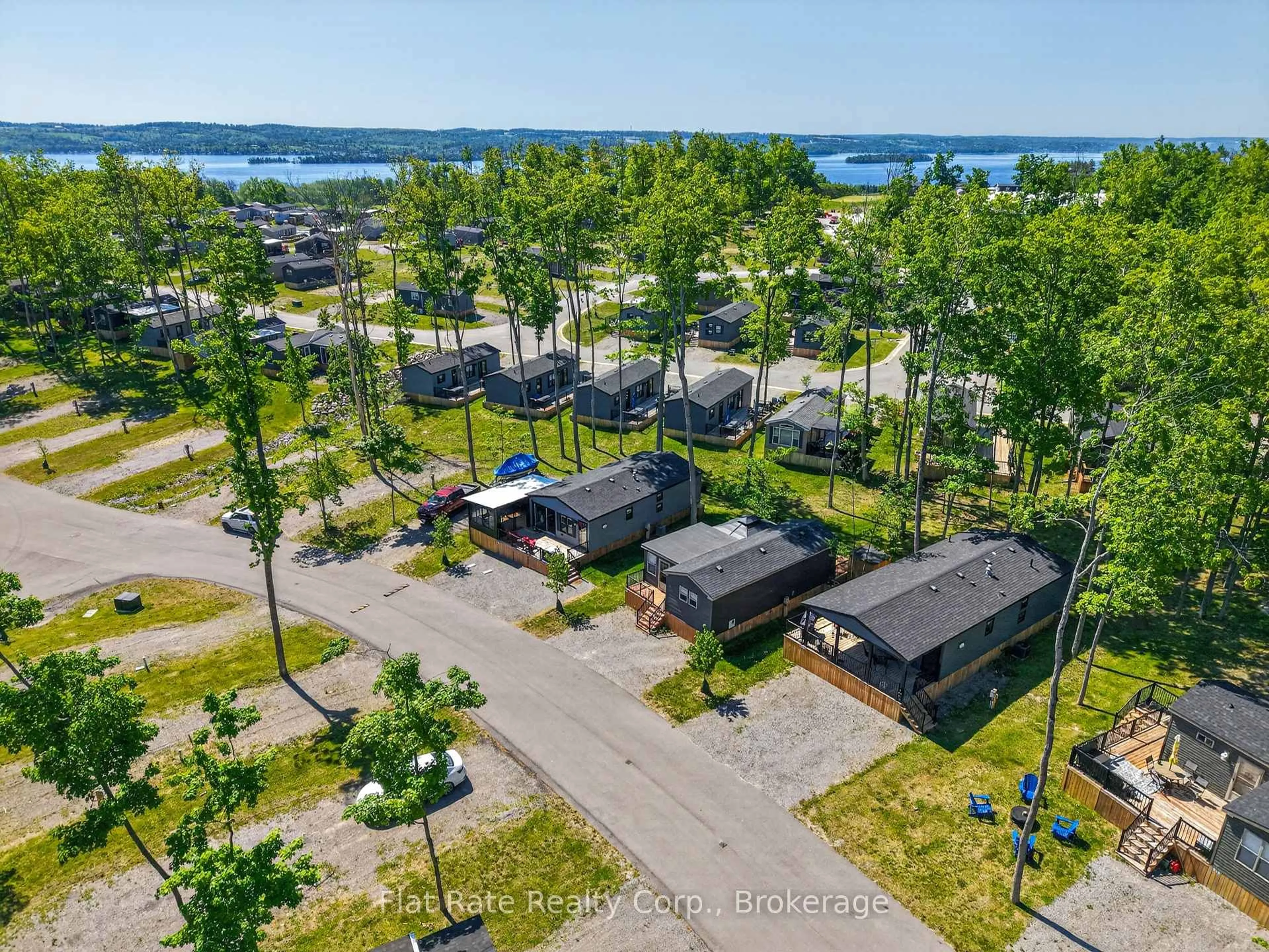 A pic from outside/outdoor area/front of a property/back of a property/a pic from drone, water/lake/river/ocean view for 1235 Villiers Line #ROSEDALE LANE #5, Otonabee-South Monaghan Ontario K0L 2G0