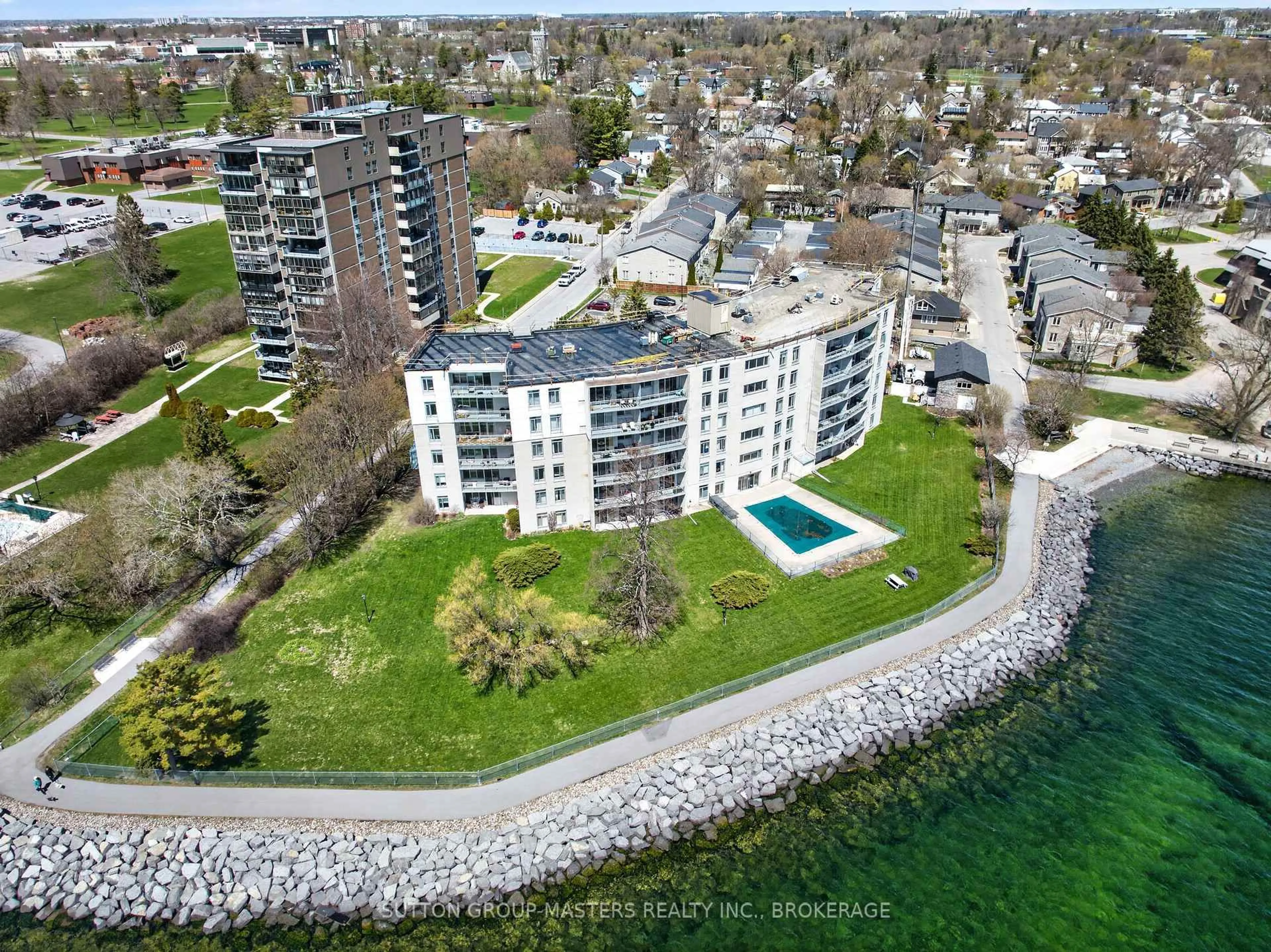 A pic from outside/outdoor area/front of a property/back of a property/a pic from drone, water/lake/river/ocean view for 1 Mowat Ave #401, Kingston Ontario K7M 1J8