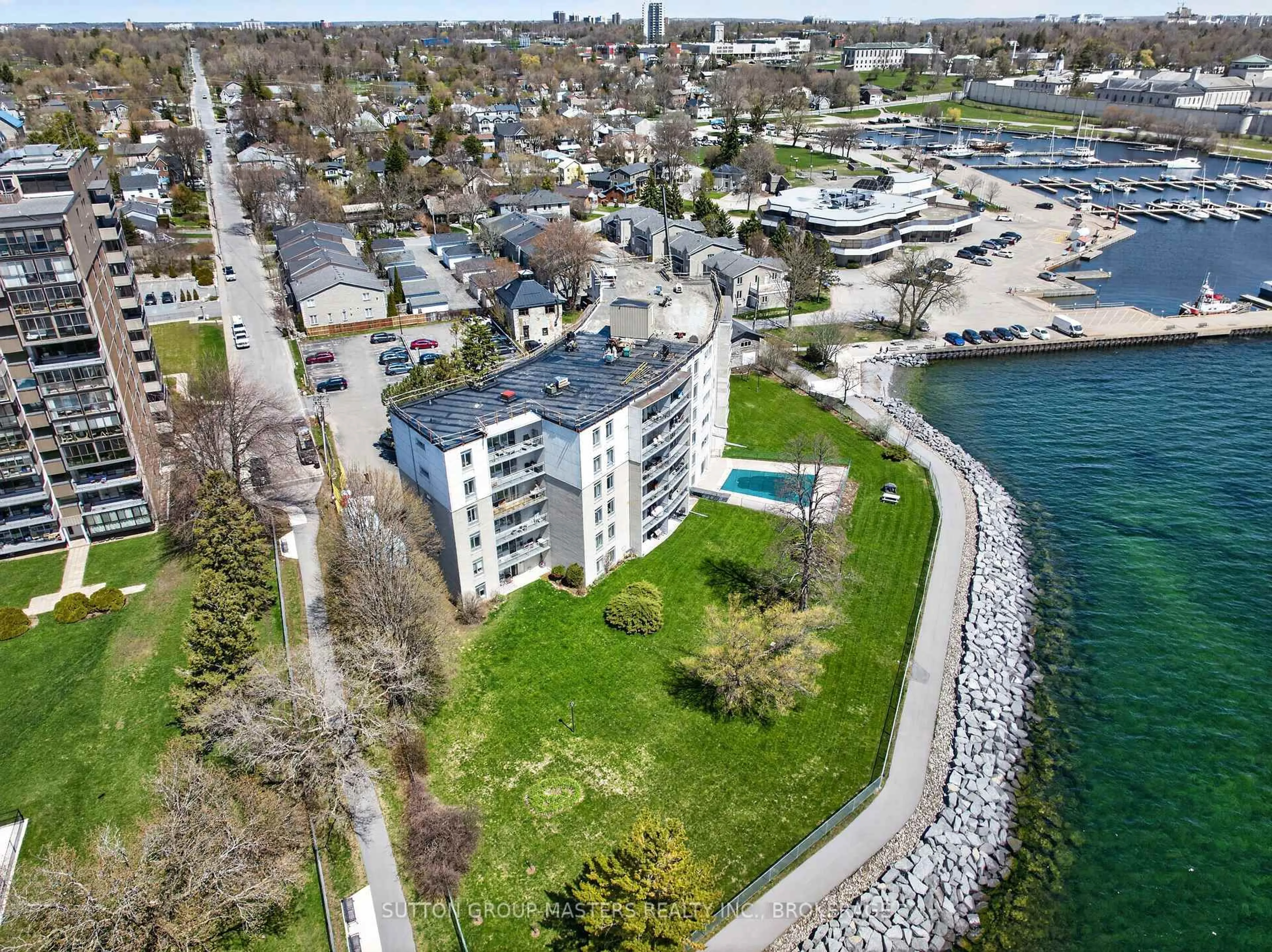 A pic from outside/outdoor area/front of a property/back of a property/a pic from drone, water/lake/river/ocean view for 1 Mowat Ave #401, Kingston Ontario K7M 1J8