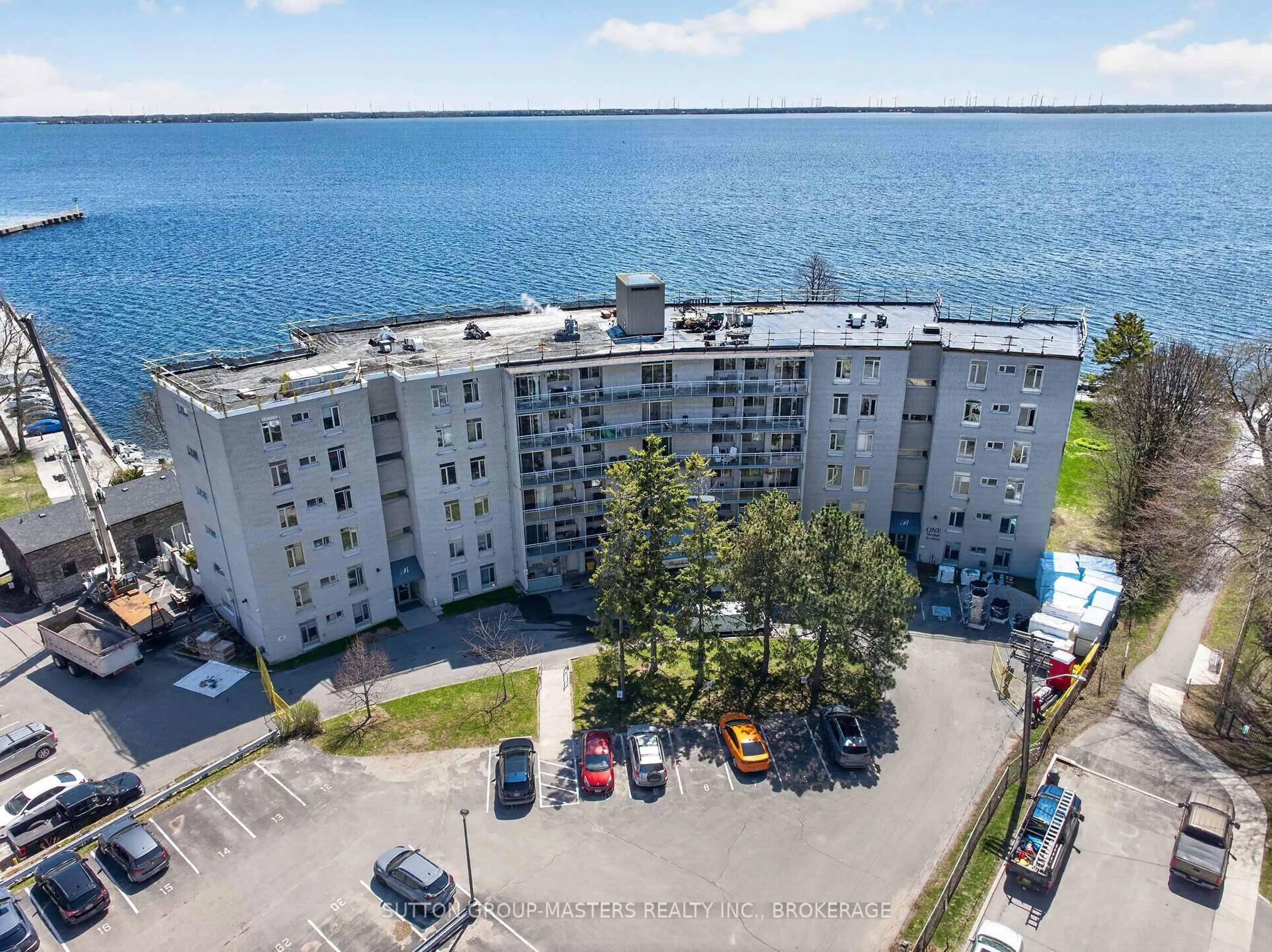 A pic from outside/outdoor area/front of a property/back of a property/a pic from drone, water/lake/river/ocean view for 1 Mowat Ave #401, Kingston Ontario K7M 1J8