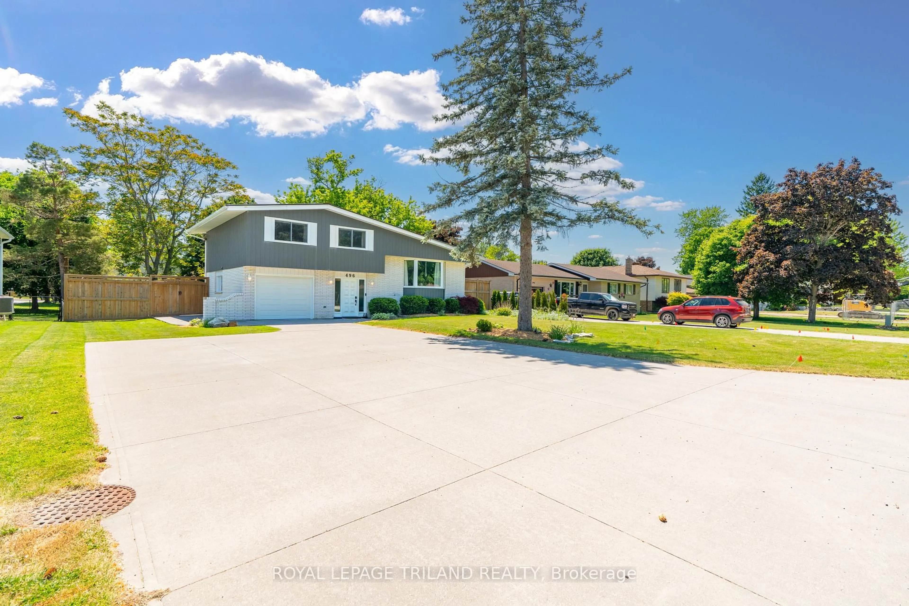 A pic from outside/outdoor area/front of a property/back of a property/a pic from drone, street for 496 Thames St, Plympton-Wyoming Ontario N0N 1T0