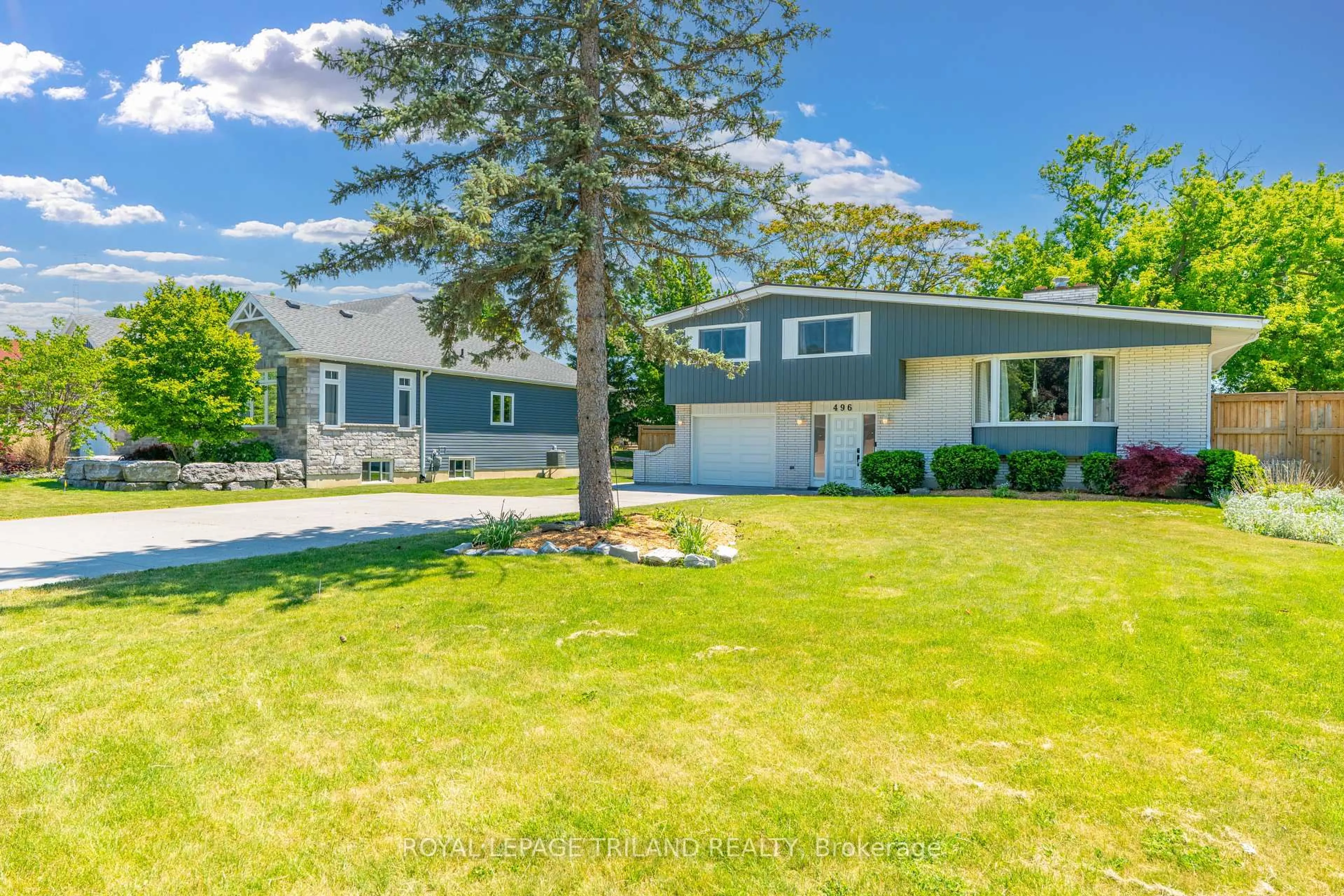A pic from outside/outdoor area/front of a property/back of a property/a pic from drone, street for 496 Thames St, Plympton-Wyoming Ontario N0N 1T0