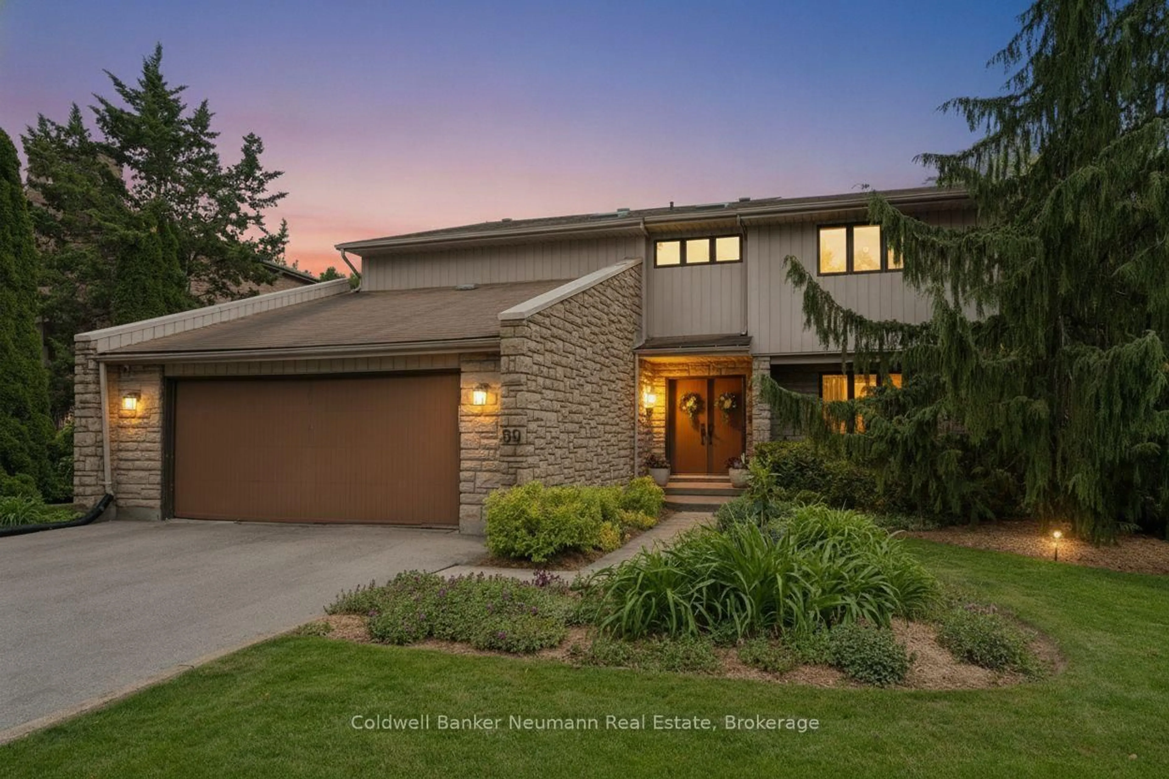 Home with brick exterior material, street for 69 Woodland Glen Dr, Guelph Ontario N1G 3S3