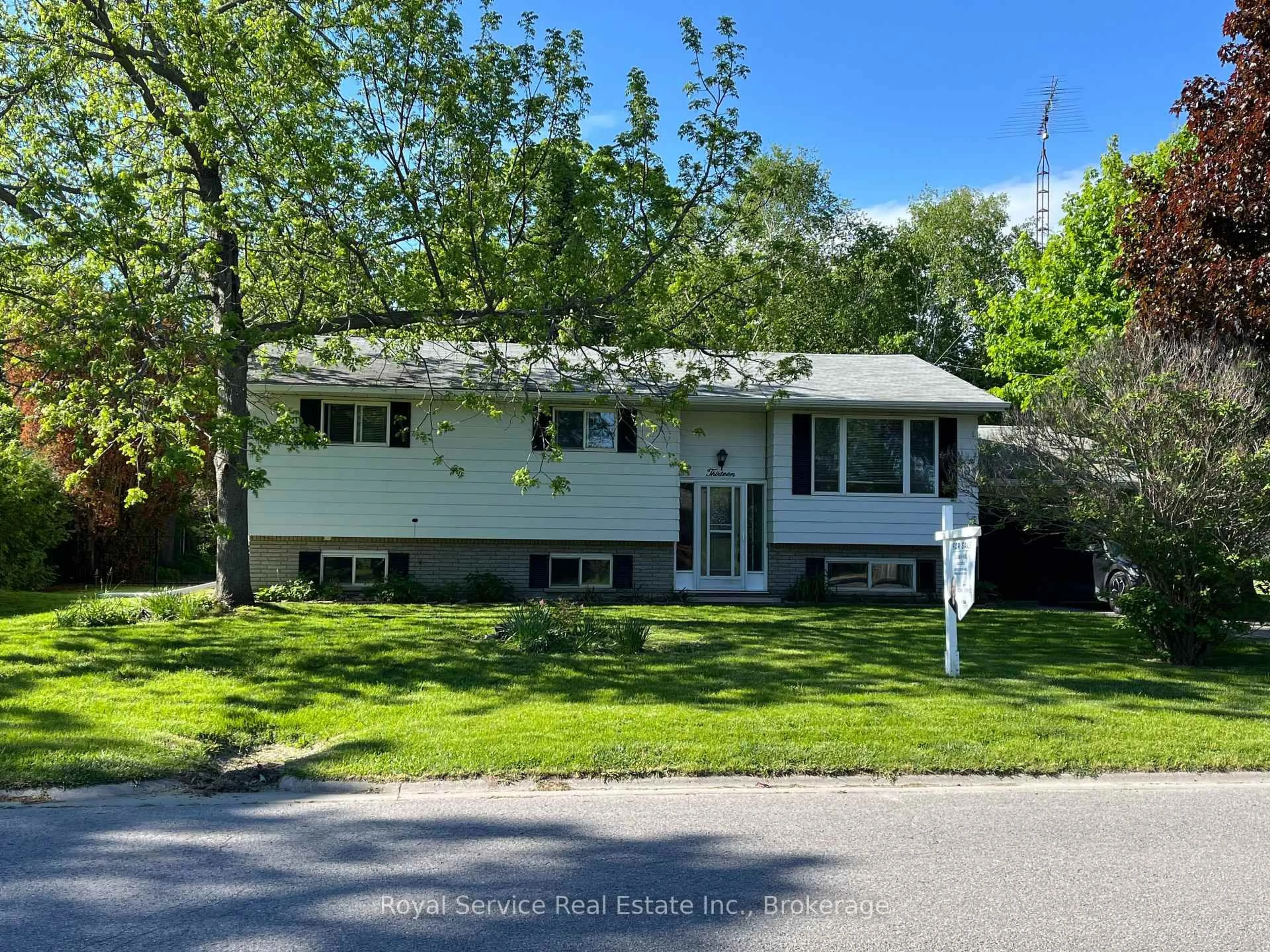 Home with vinyl exterior material, street for 13 Creek St, Cramahe Ontario K0K 1S0