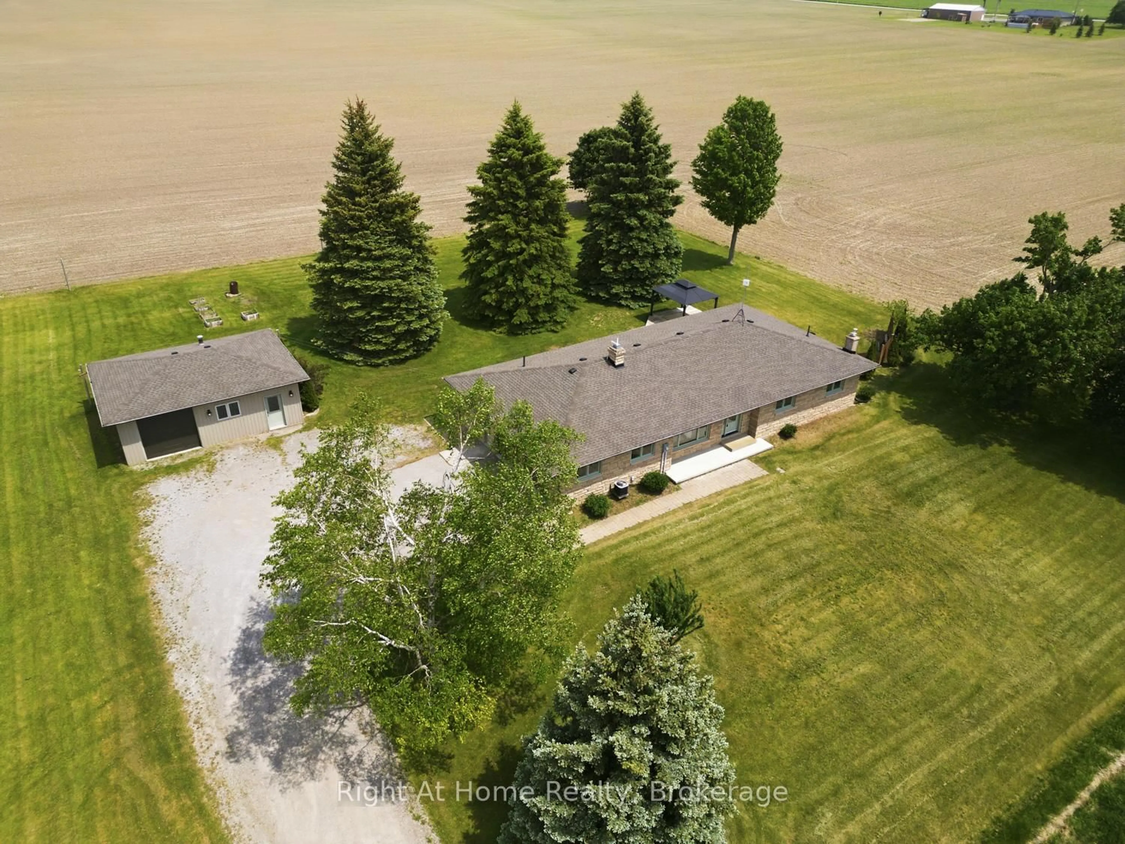A pic from outside/outdoor area/front of a property/back of a property/a pic from drone, water/lake/river/ocean view for 562 Janetville Rd, Kawartha Lakes Ontario L0B 1K0