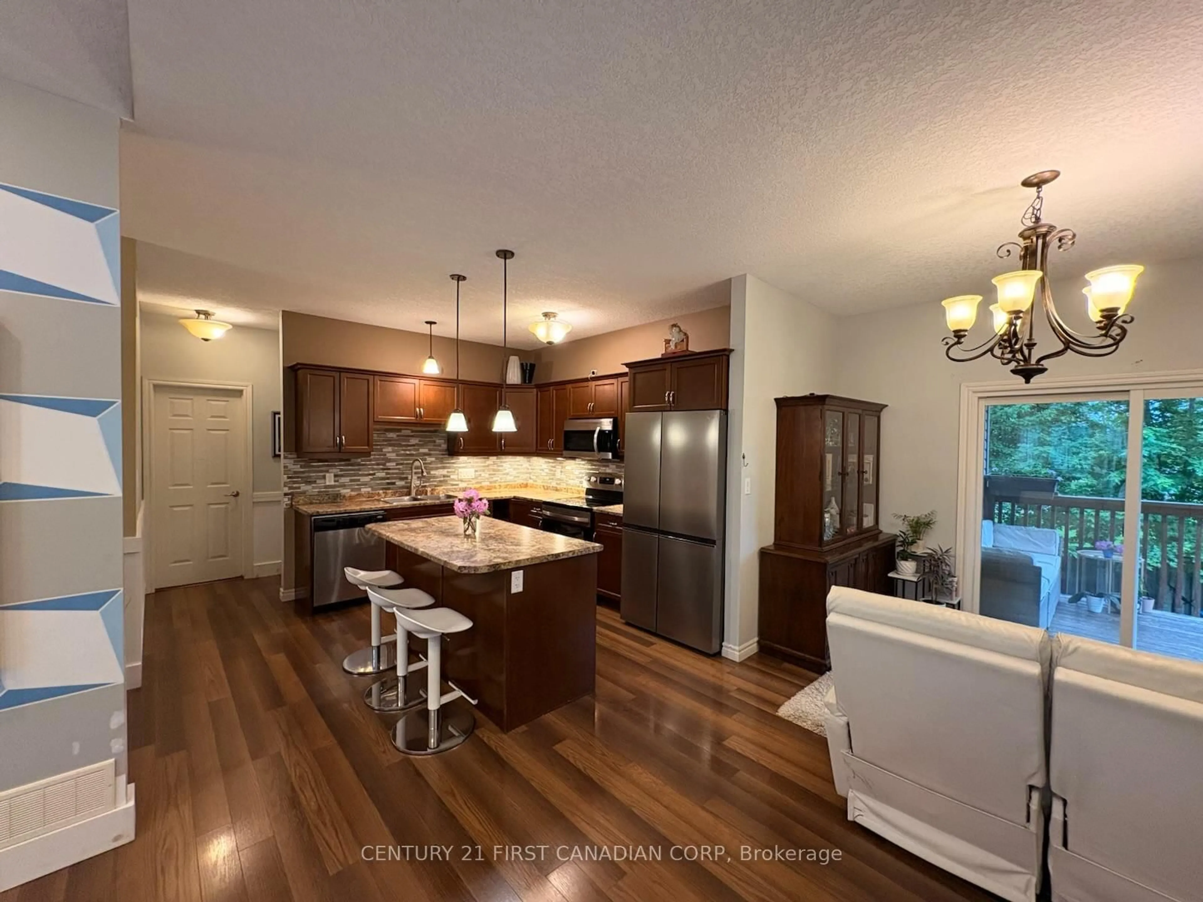 Open concept kitchen, wood/laminate floor for 11 Jacklin Crt, Central Elgin Ontario N5P 0C3