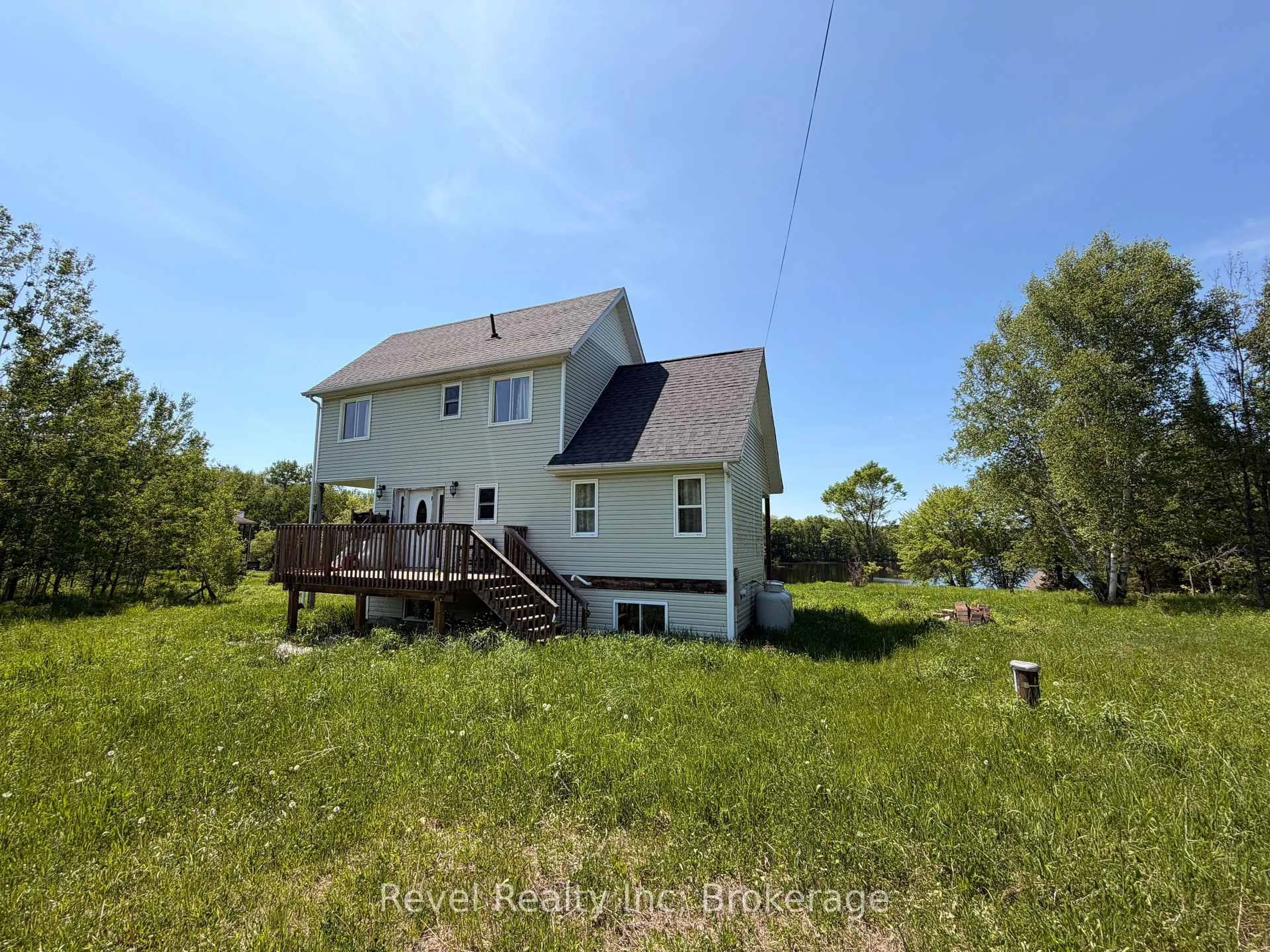 A pic from outside/outdoor area/front of a property/back of a property/a pic from drone, unknown for 64 Jones Rd, McKellar Ontario P2A 2W7