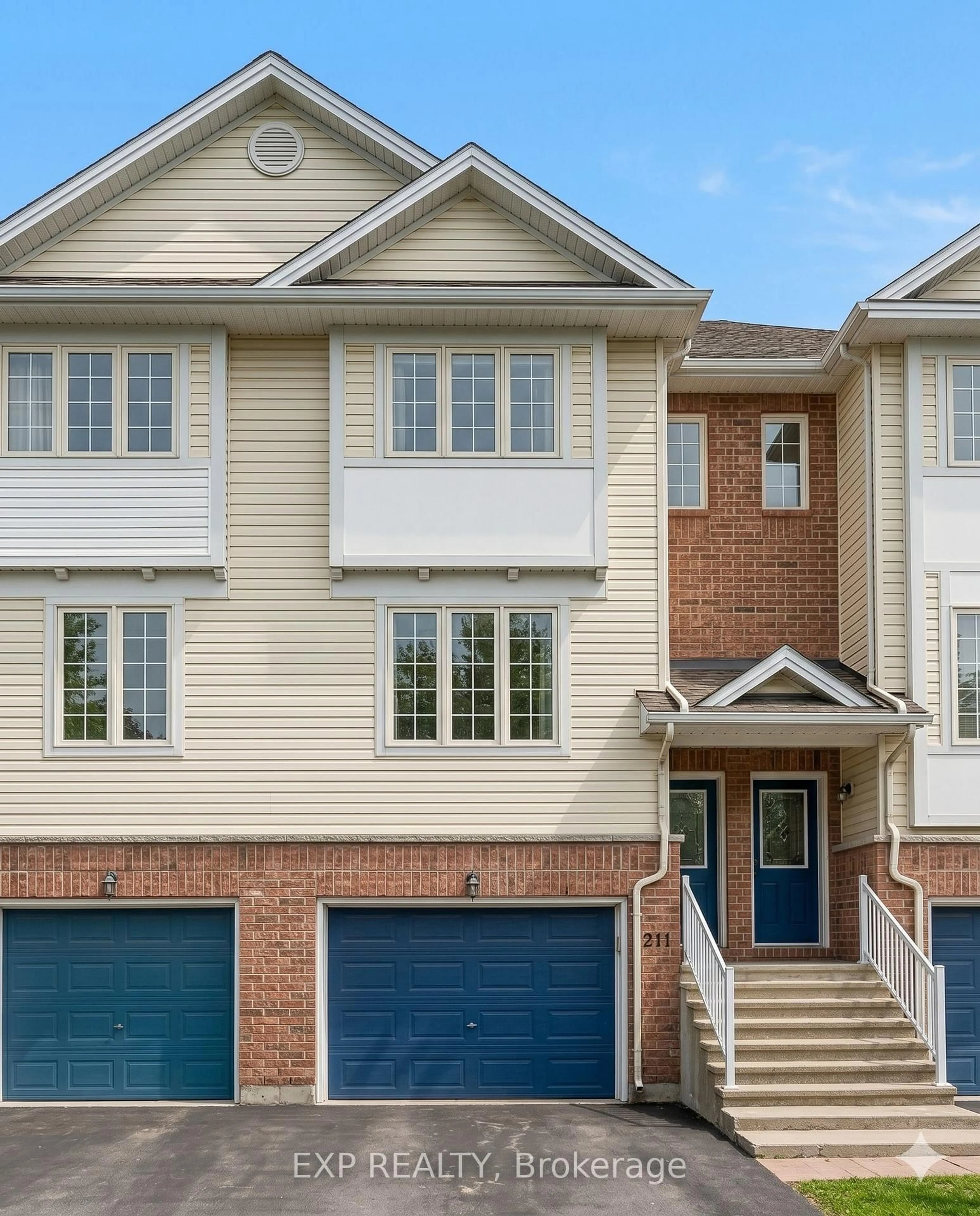 Home with brick exterior material, street for 211 Gershwin Private, Ottawa Ontario K2H 1G6