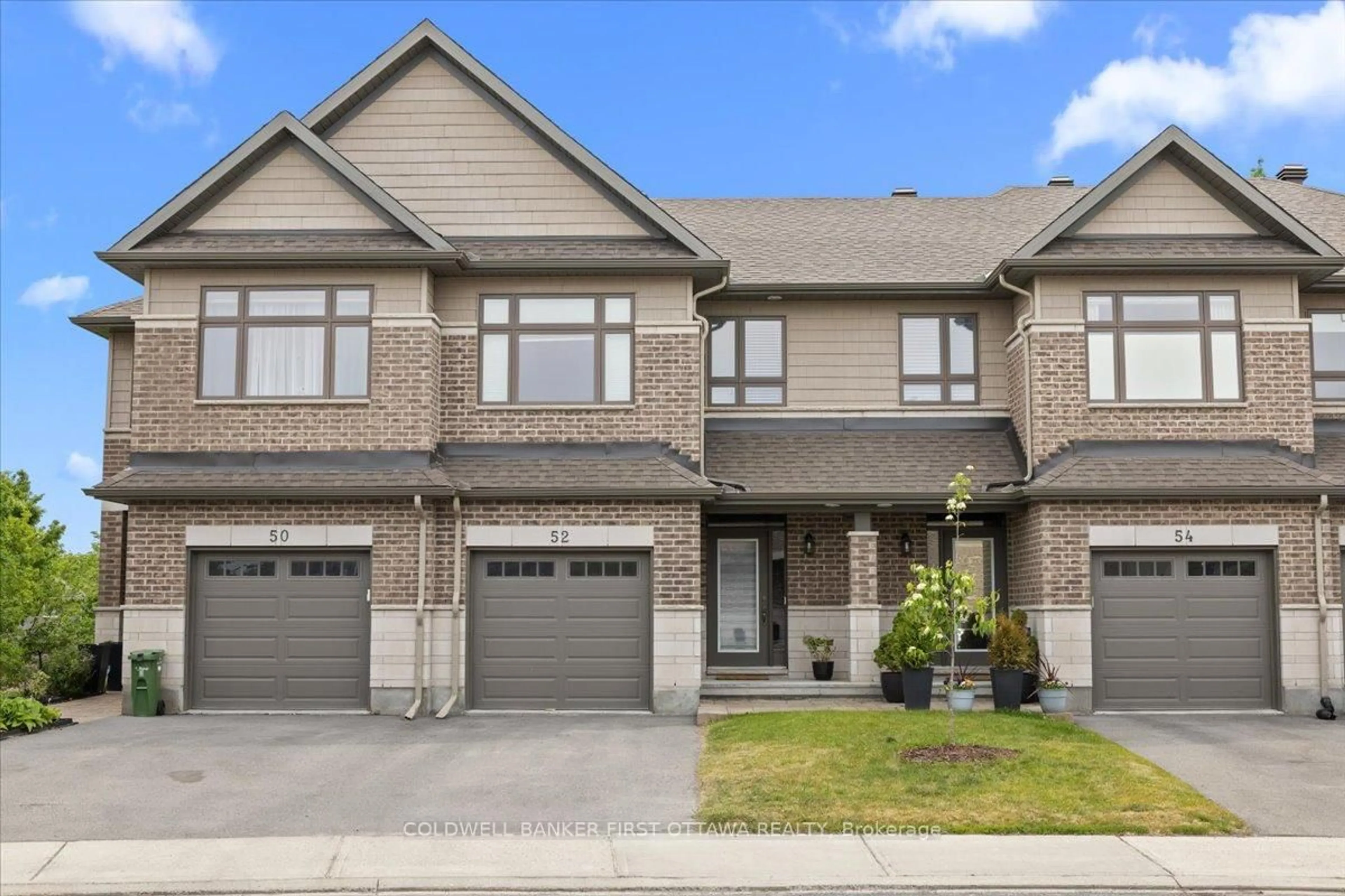 Home with brick exterior material, street for 52 Porter St, Stittsville Ontario K2S 2L9